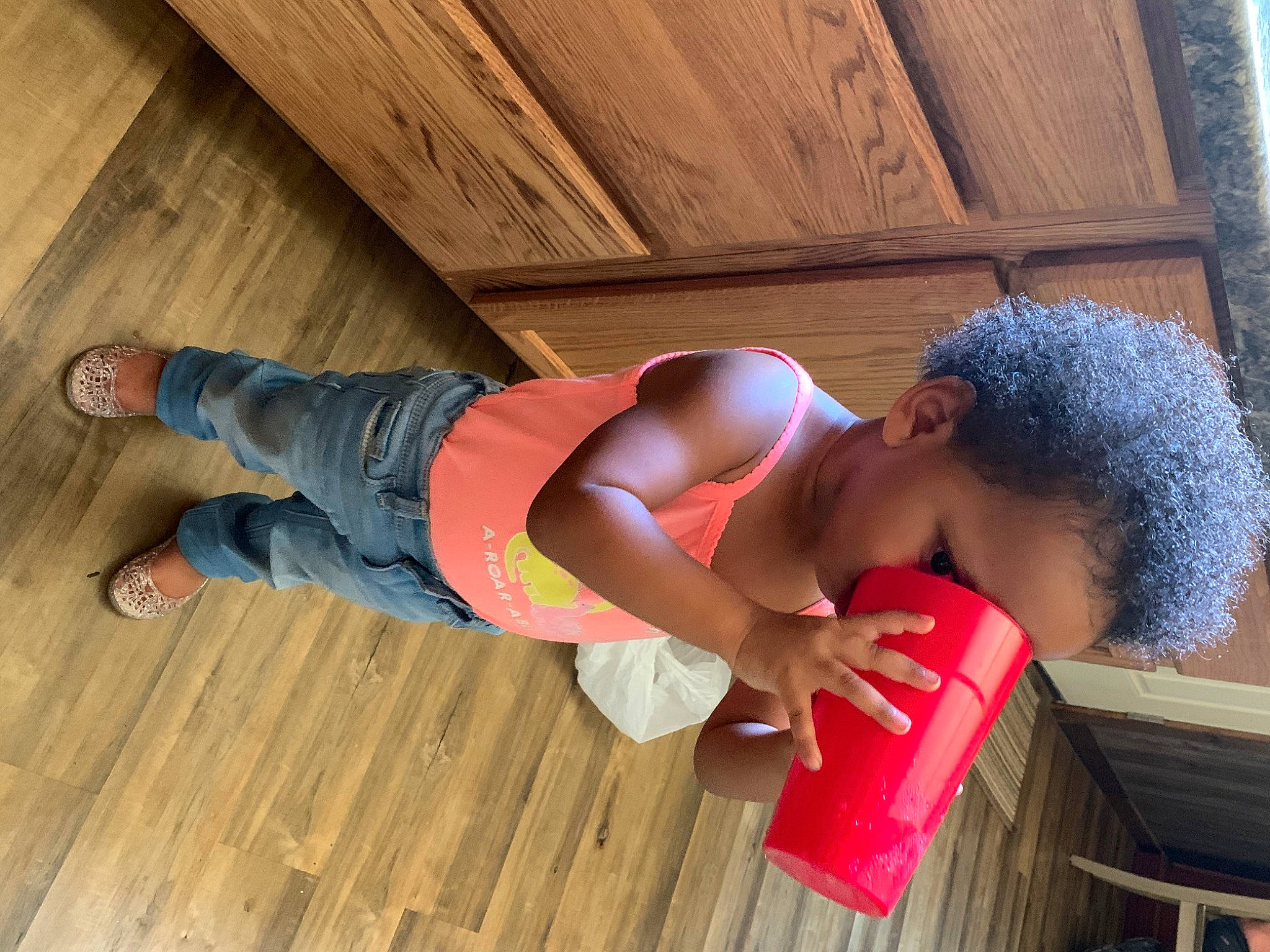 Malikiah joined the competition — help win amazing prizes! abdomen, arm, elbow, flooring, fun, happy, hardwood, human_leg, knee, leisure, person, shorts, shoulder, sitting, thigh, toddler, trunk, varnish, waist, wood