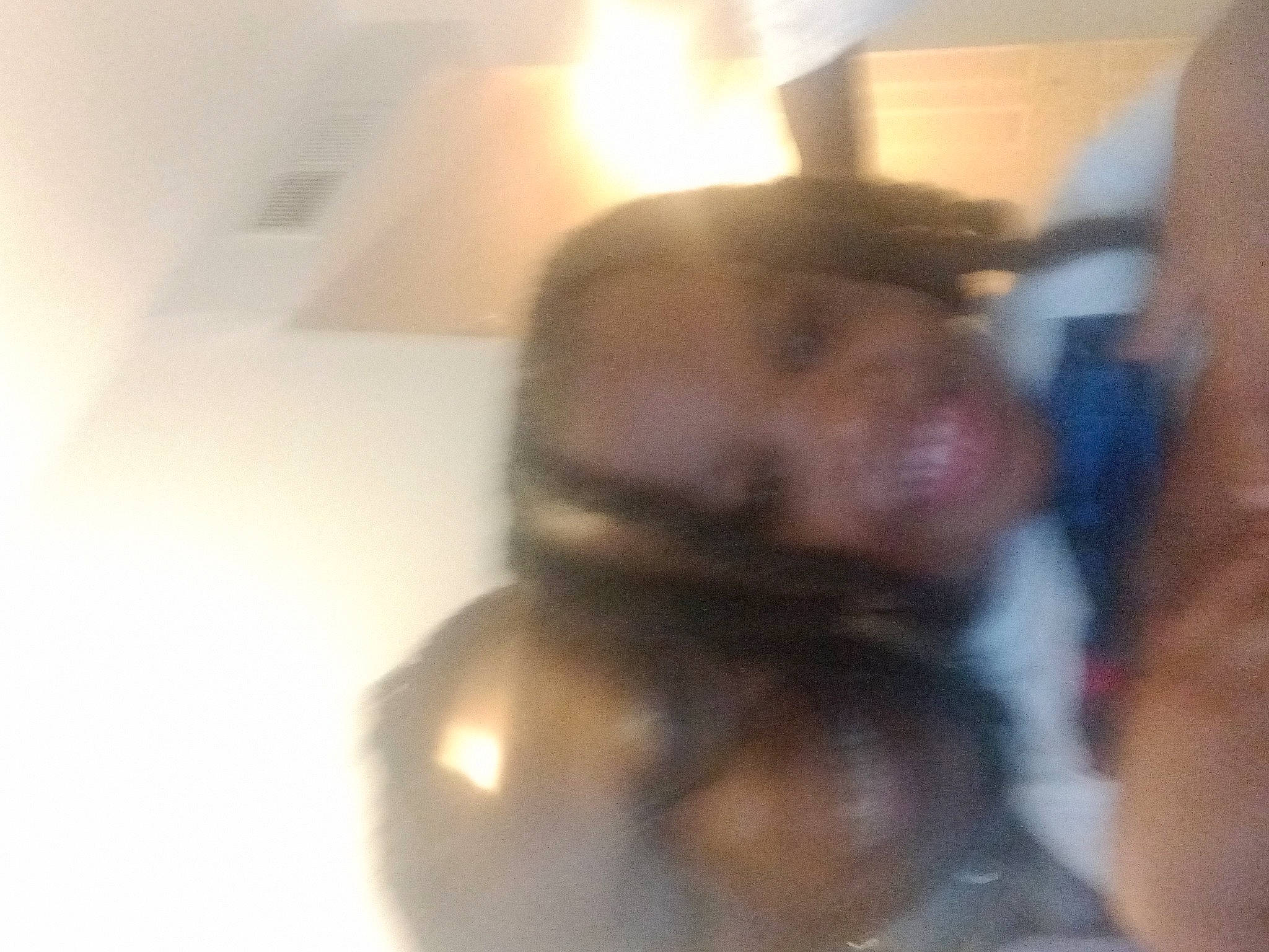 Bryson joined the competition — help win amazing prizes! beard, ceiling, chest, facial_hair, flooring, fun, fur, person, room, sitting, thumb