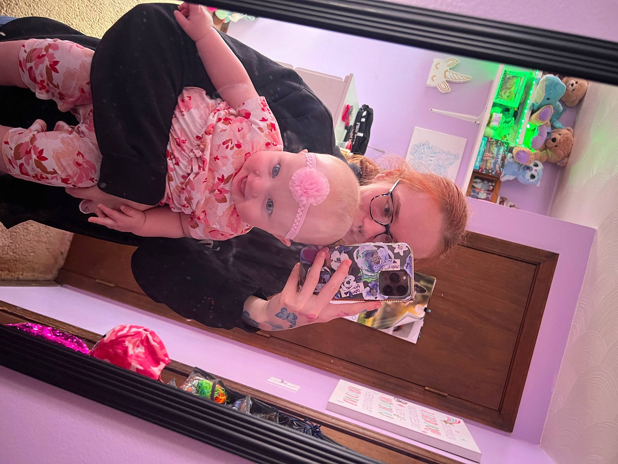 Aurora is registered to the contest to win money with this photo: art, baby, display_device, dress, fashion, flat_panel_display, flesh, gadget, headwear, human_leg, machine, magenta, multimedia, person, picture_frame, pink, product, room, shelf, television_set