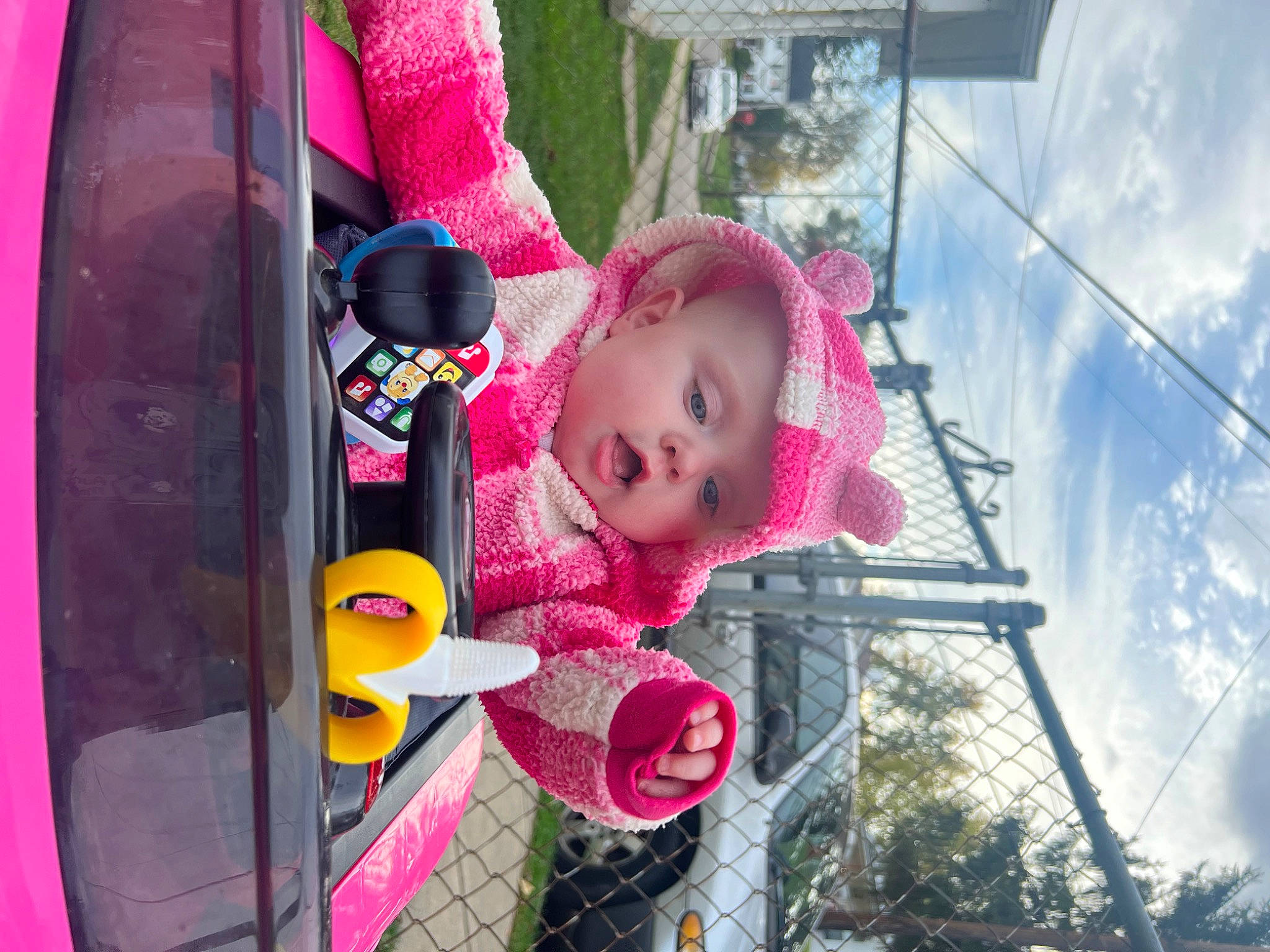 Aurora is registered to the contest to win money with this photo: child, cloud, fun, happy, hat, headwear, leisure, magenta, person, pink, plant, purple, recreation, red, sky, toddler, toy, tree, violet, window