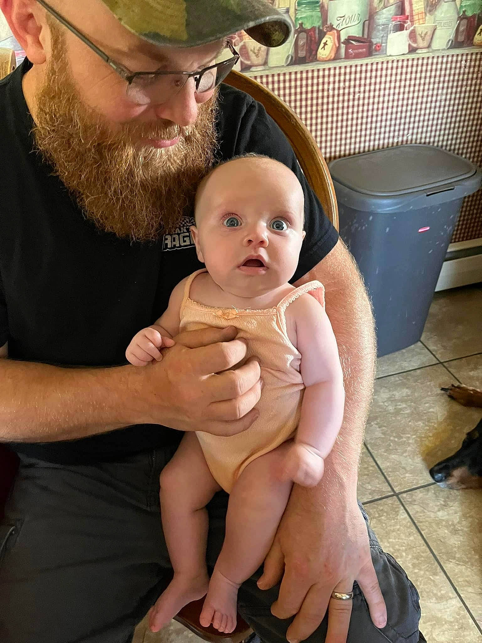 Aurora is registered to the contest to win money with this photo: abdomen, baby, baseball_cap, beard, cap, chest, eyewear, face, fun, gesture, hairstyle, happy, lap, leg, person, skin, stomach, surprise, thigh, thumb