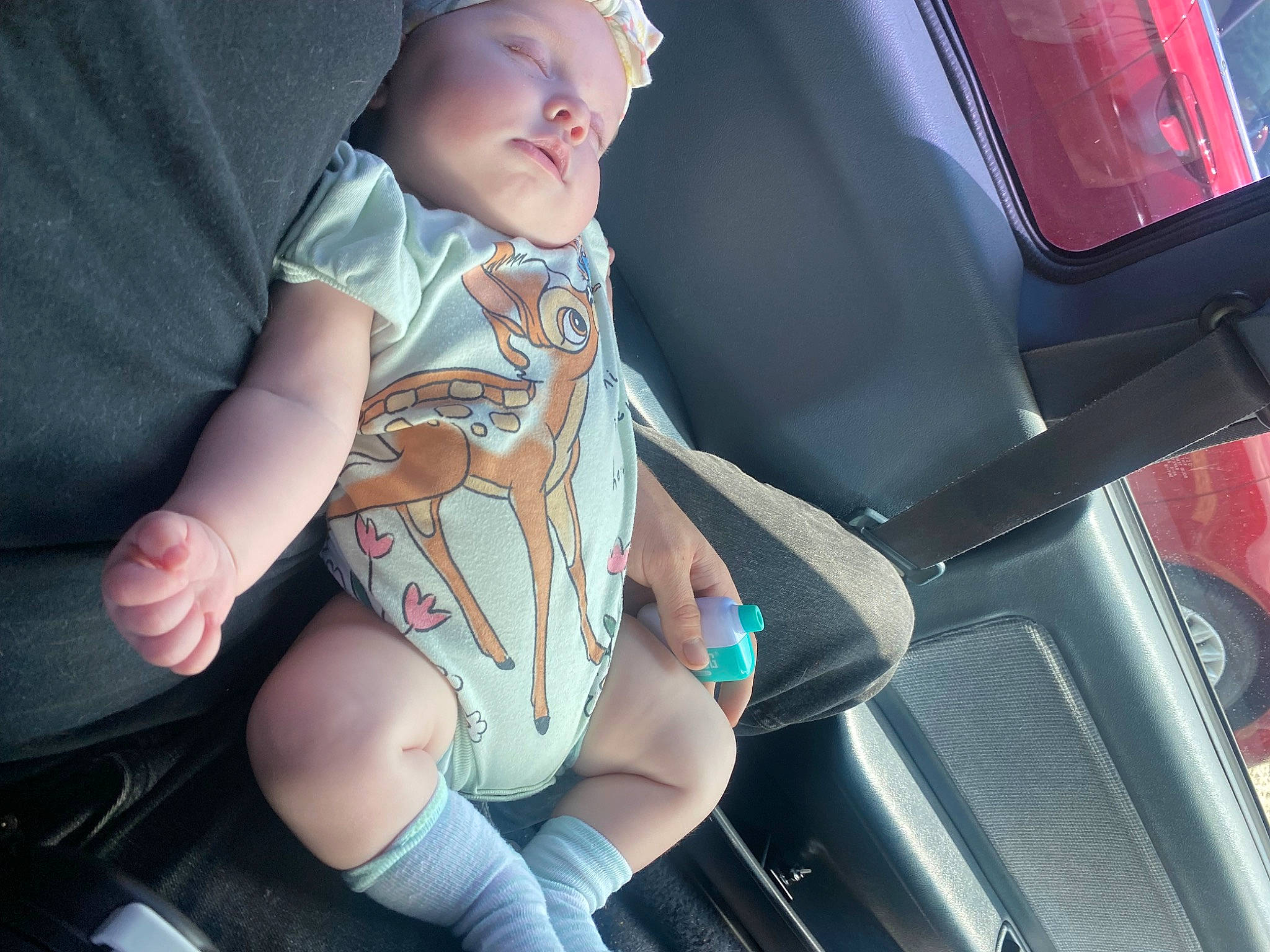 Aurora is registered to the contest to win money with this photo: auto_part, automotive_design, automotive_exterior, automotive_lighting, car, car_seat, car_seat_cover, electric_blue, finger, hat, headwear, human_leg, leg, motor_vehicle, nail, person, personal_luxury_car, steering_wheel, thigh, thumb