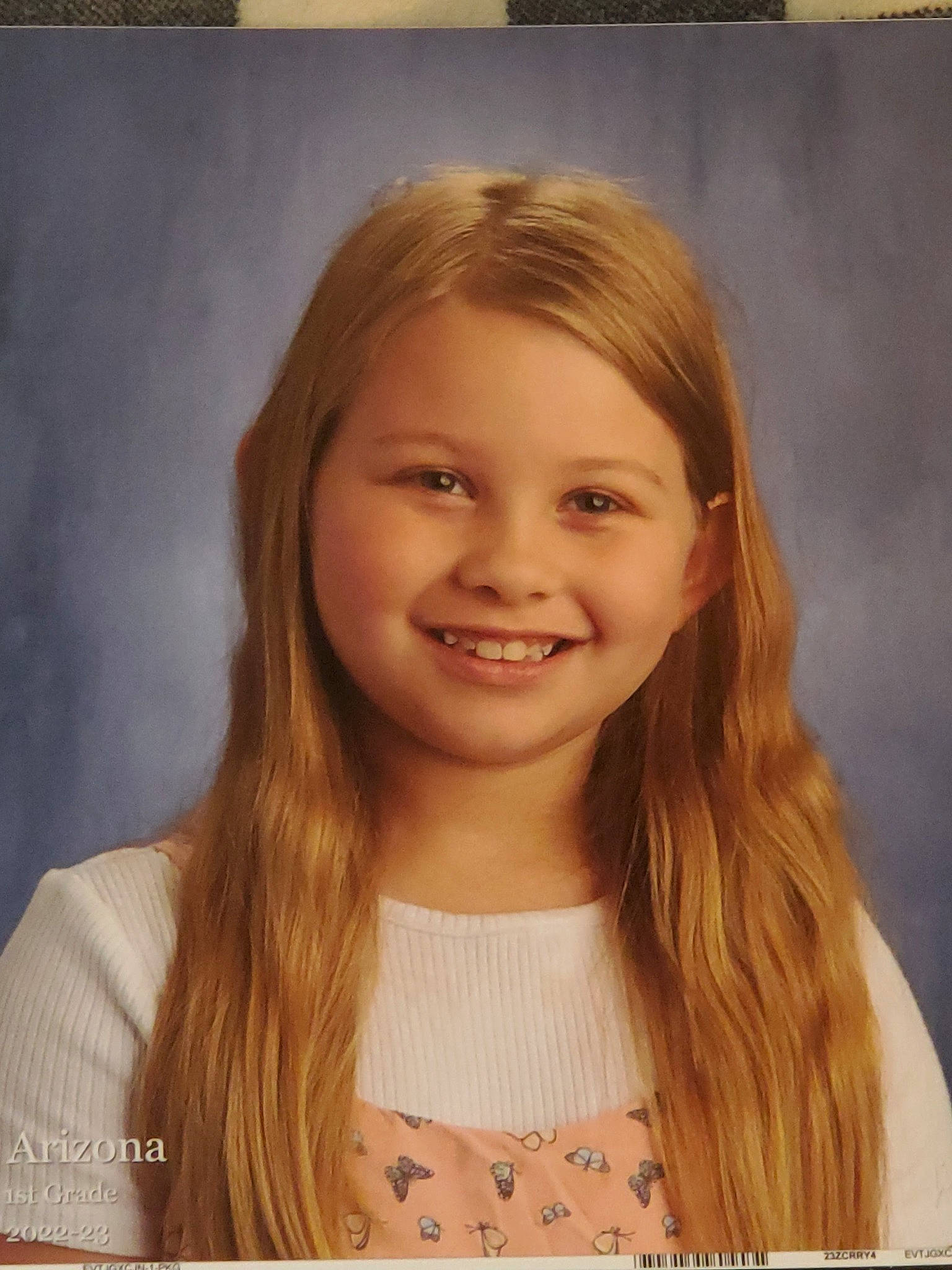 Arizona is registered to the contest to win money with this photo: art, cheek, chin, eyebrow, eyelash, face, flash_photography, forehead, happy, iris, jaw, joy, layered_hair, lip, long_hair, makeover, neck, person, shoulder, skin