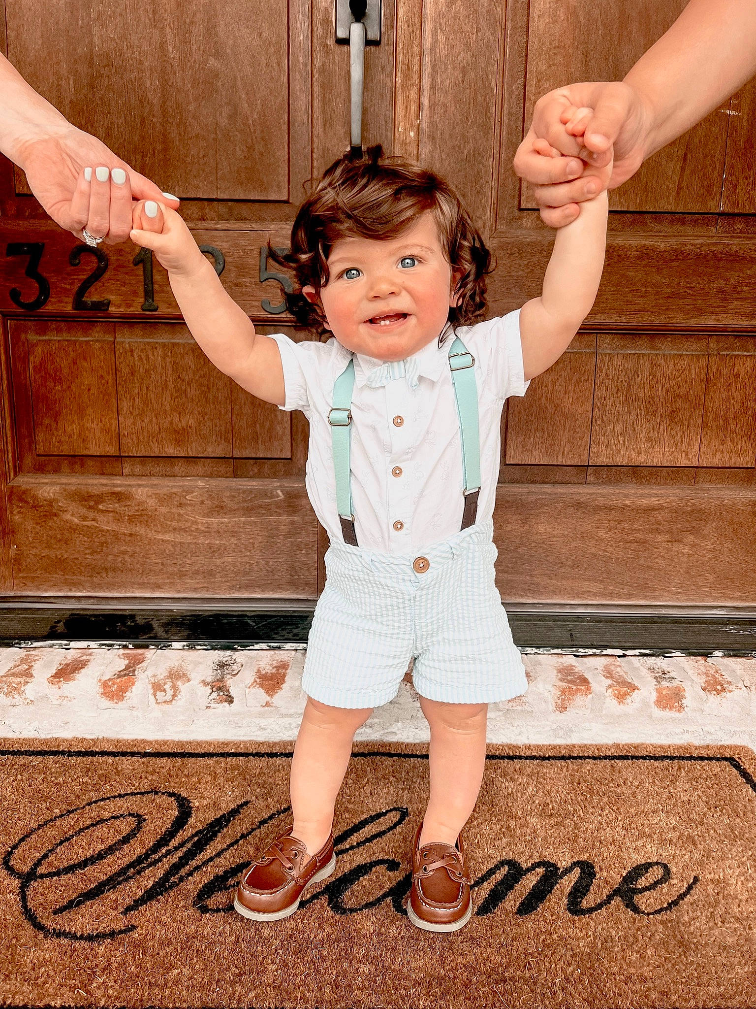 Bennett is registered to the contest to win money with this photo: arm, baby, baby_toddler_clothing, child, door, finger, flash_photography, fun, gesture, hand, happy, orange, pattern, people_in_nature, person, product, sleeve, standing, toddler, waist