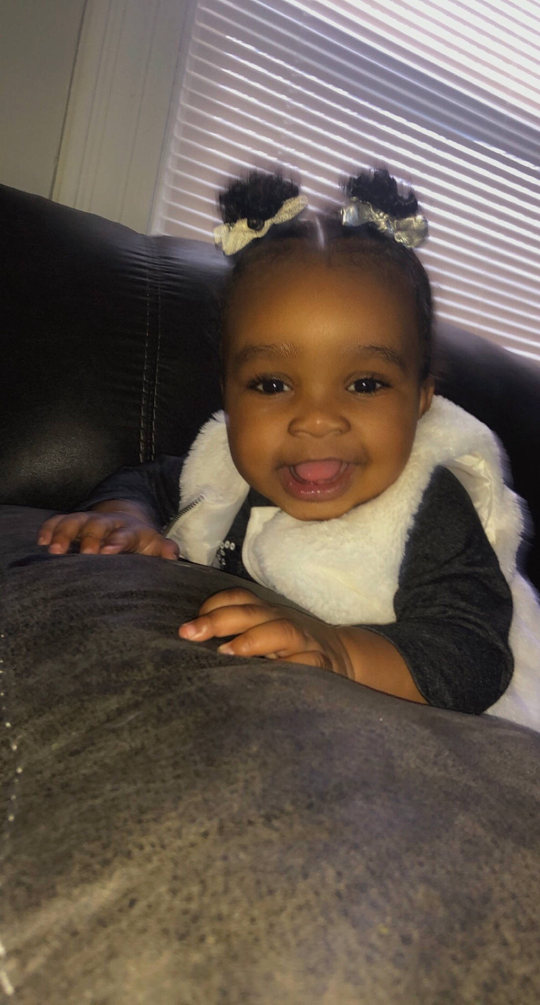 Araya joined the competition — help win amazing prizes! baby, baby_toddler_clothing, child, couch, eye, eyebrow, hair_accessory, headband, headpiece, iris, joy, living_room, mouth, nose, person, toddler, window_blind, window_covering, window_treatment