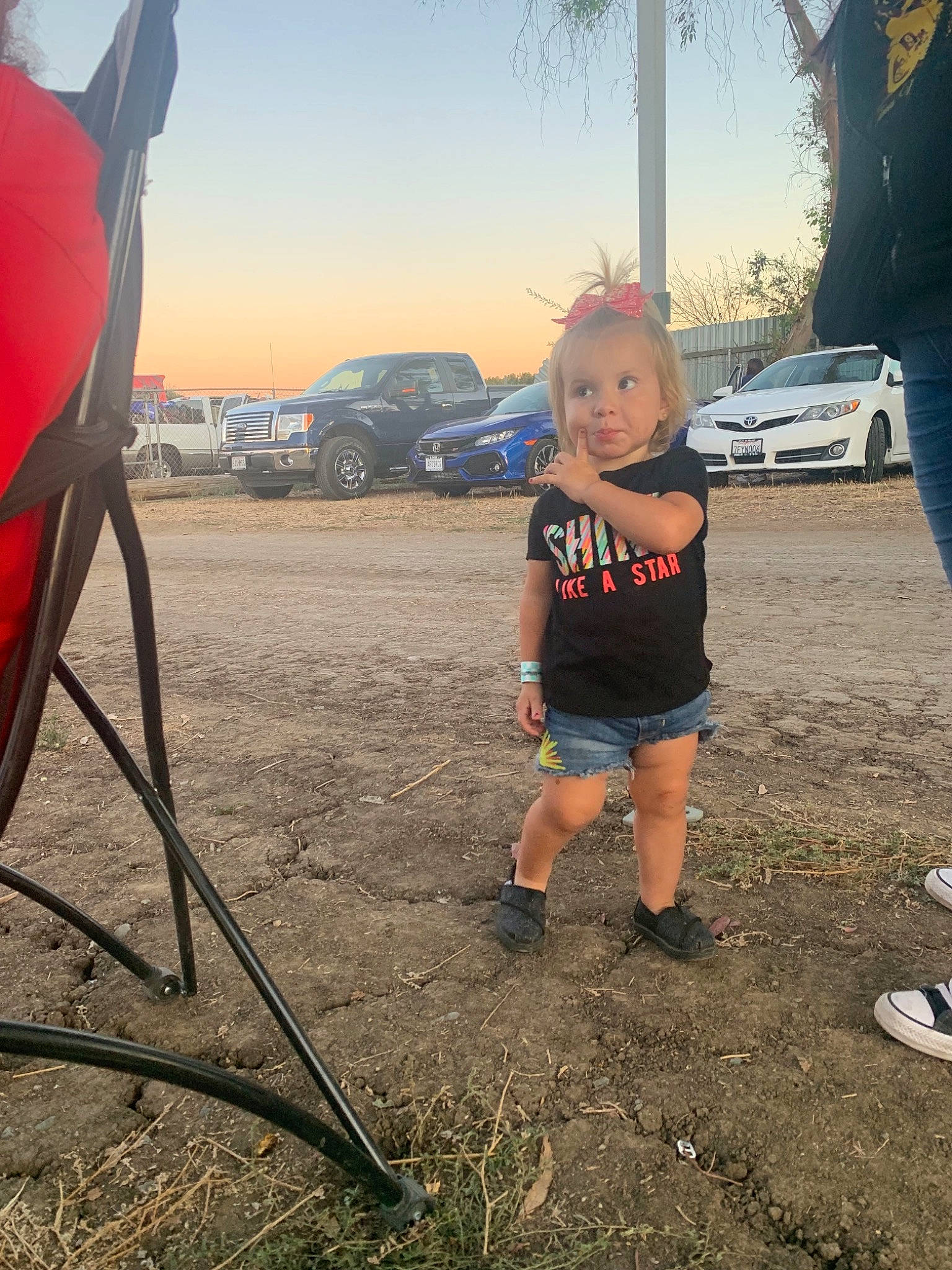 Analise is registered to the contest to win money with this photo: car, child, cloud, fun, grass, leg, mountain, person, plant, play, recreation, sky, summer, toddler, tree, vacation, vehicle