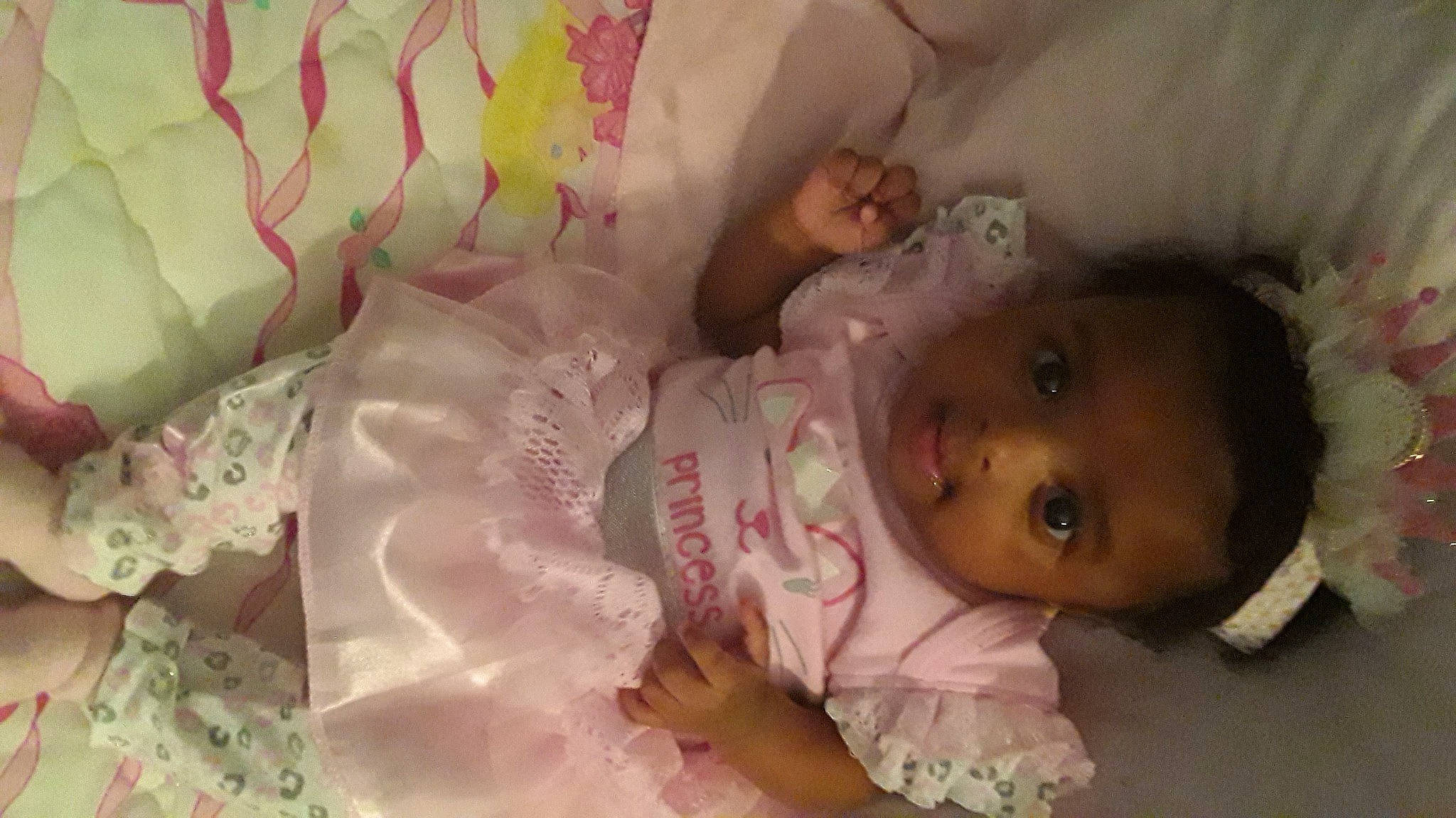 Gwendolyn is registered to the contest to win money with this photo: baby, baby_products, baby_toddler_clothing, cheek, child, comfort, ear, eye, eyelash, happy, iris, linens, lip, mouth, person, pink, product, room, skin, textile