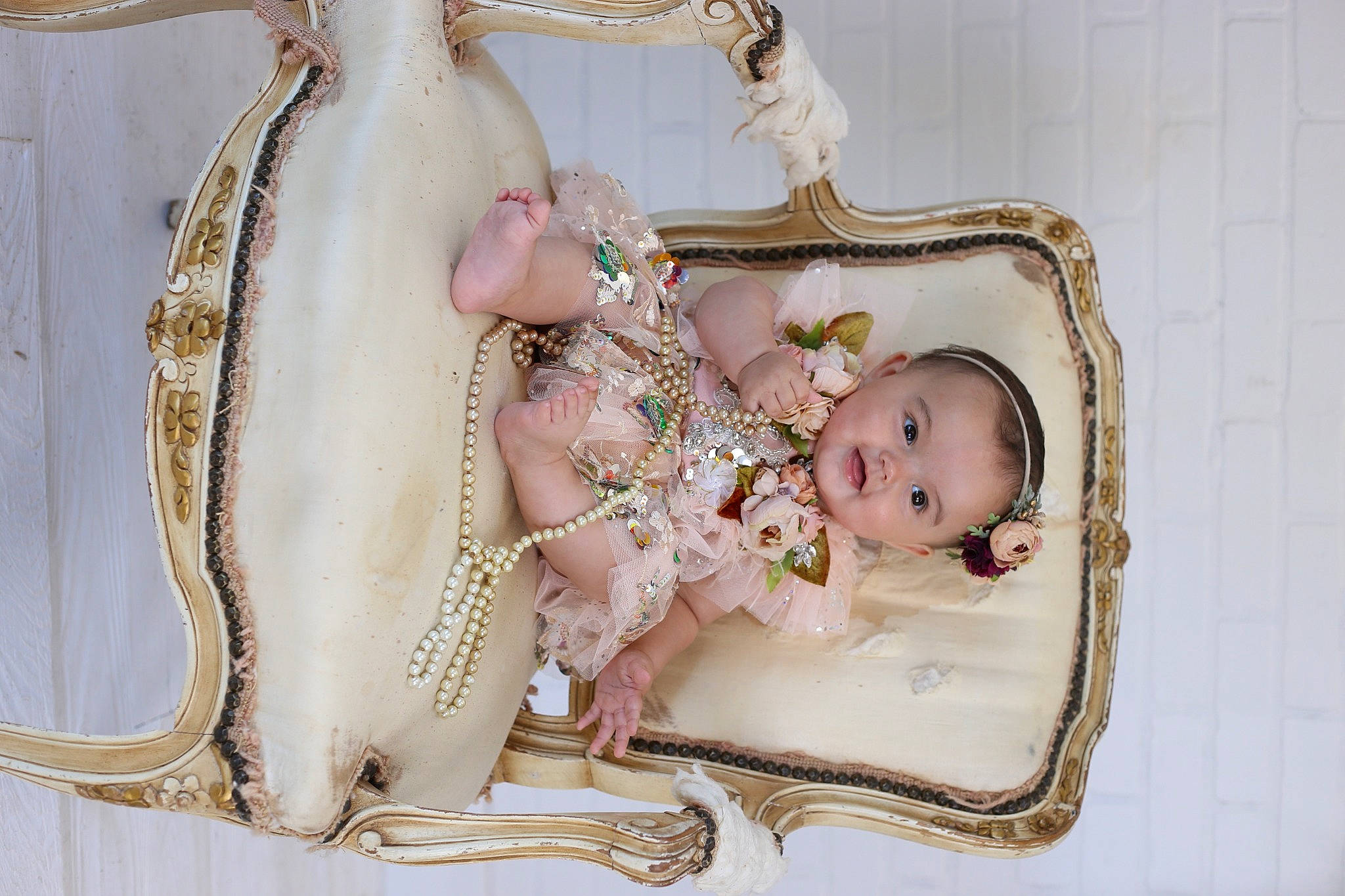 Josephine is registered to the contest to win money with this photo: baby, baby_toddler_clothing, bag, child, embellishment, fashion_accessory, hair_accessory, headpiece, jewellery, metal, pattern, peach, person, picture_frame, rectangle, shoulder_bag, sitting, still_life_photography, toddler, wrist