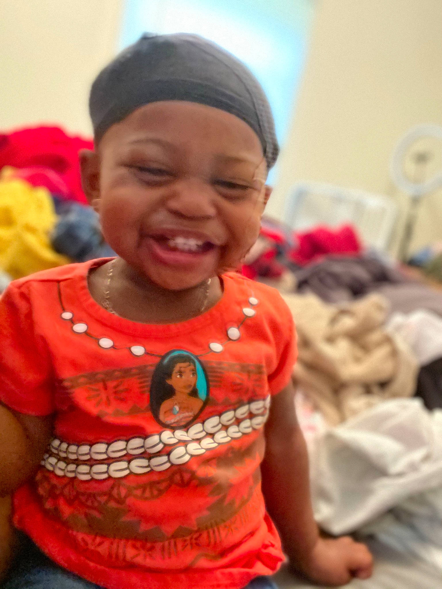 Serenity is registered to the contest to win money with this photo: arm, baby_toddler_clothing, cheek, child, facial_expression, forehead, fun, happy, headgear, headwear, joy, lip, mouth, nose, person, pink, skin, sleeve, smile, t_shirt