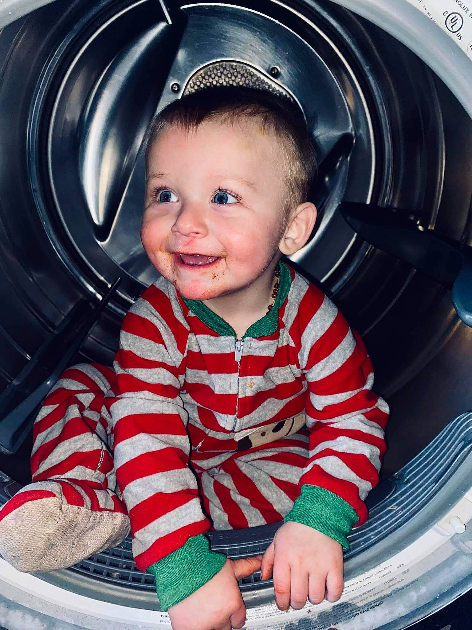 Kolt is registered to the contest to win money with this photo: auto_part, automotive_tire, automotive_wheel_system, baby_toddler_clothing, beauty, blue, child, chin, electric_blue, eye, flash_photography, fun, happy, joy, motor_vehicle, organ, person, product, skin, sleeve