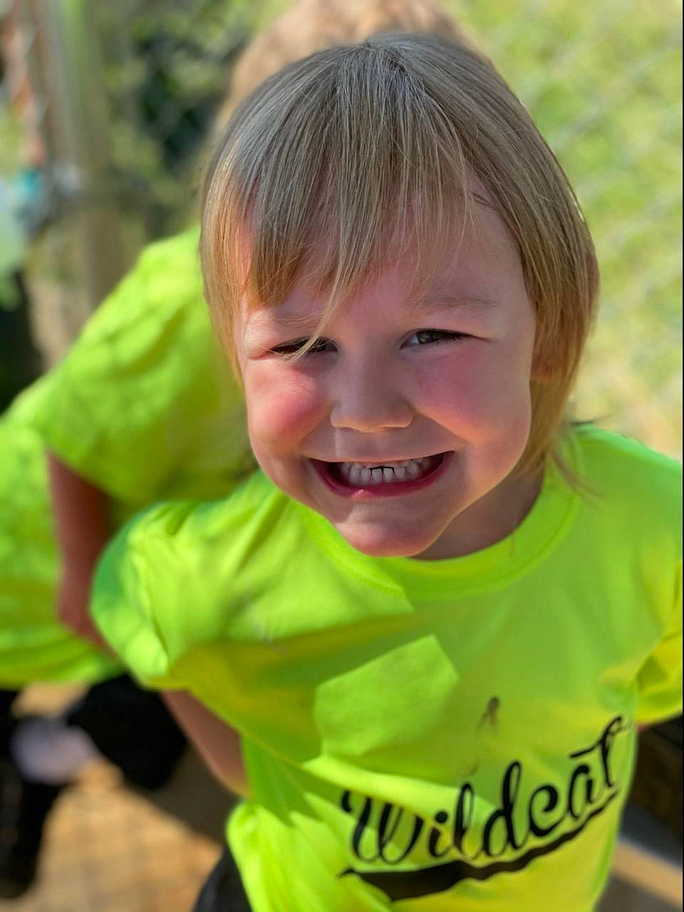 Kenzleigh joined the competition — help win amazing prizes! baby_toddler_clothing, blond, child, chin, eye, face, fun, gesture, grass, hairstyle, happy, human_body, joy, leisure, nose, people_in_nature, person, skin, sleeve, smile