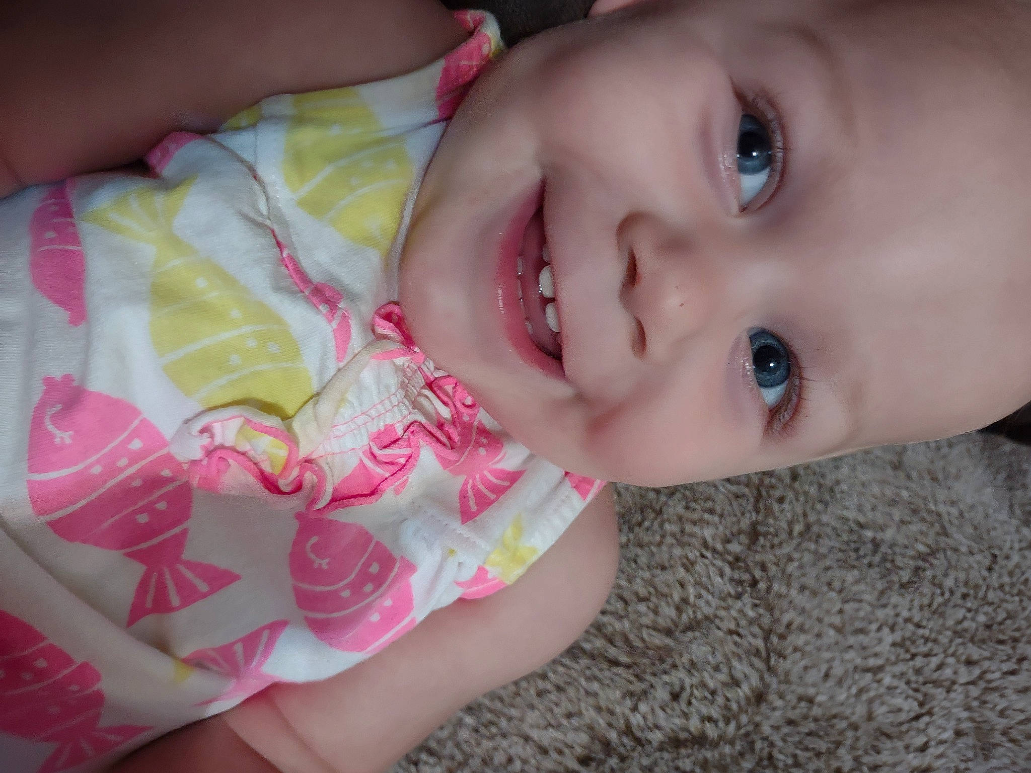 Camelia is registered to the contest to win money with this photo: baby, baby_toddler_clothing, cheek, child, ear, eye, eyelash, finger, happy, human_body, iris, joy, lip, mouth, nail, nose, person, pink, plant, skin