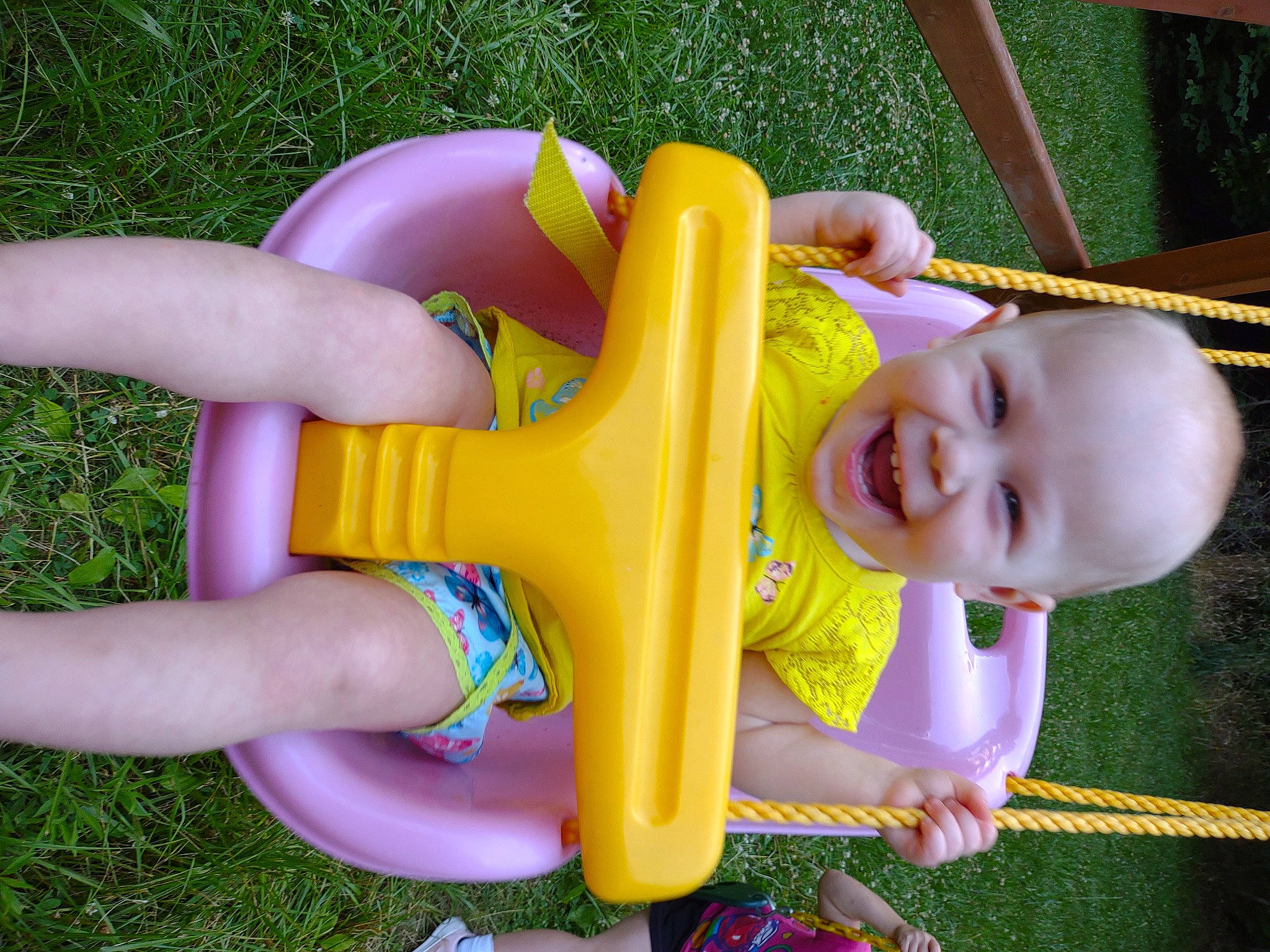 Camelia joined the competition — help win amazing prizes! baby_toddler_clothing, beauty, child, city, fun, grass, happy, leisure, outdoor_play_equipment, people_in_nature, person, pink, plant, play, recreation, sitting, smile, thigh, toddler, toy