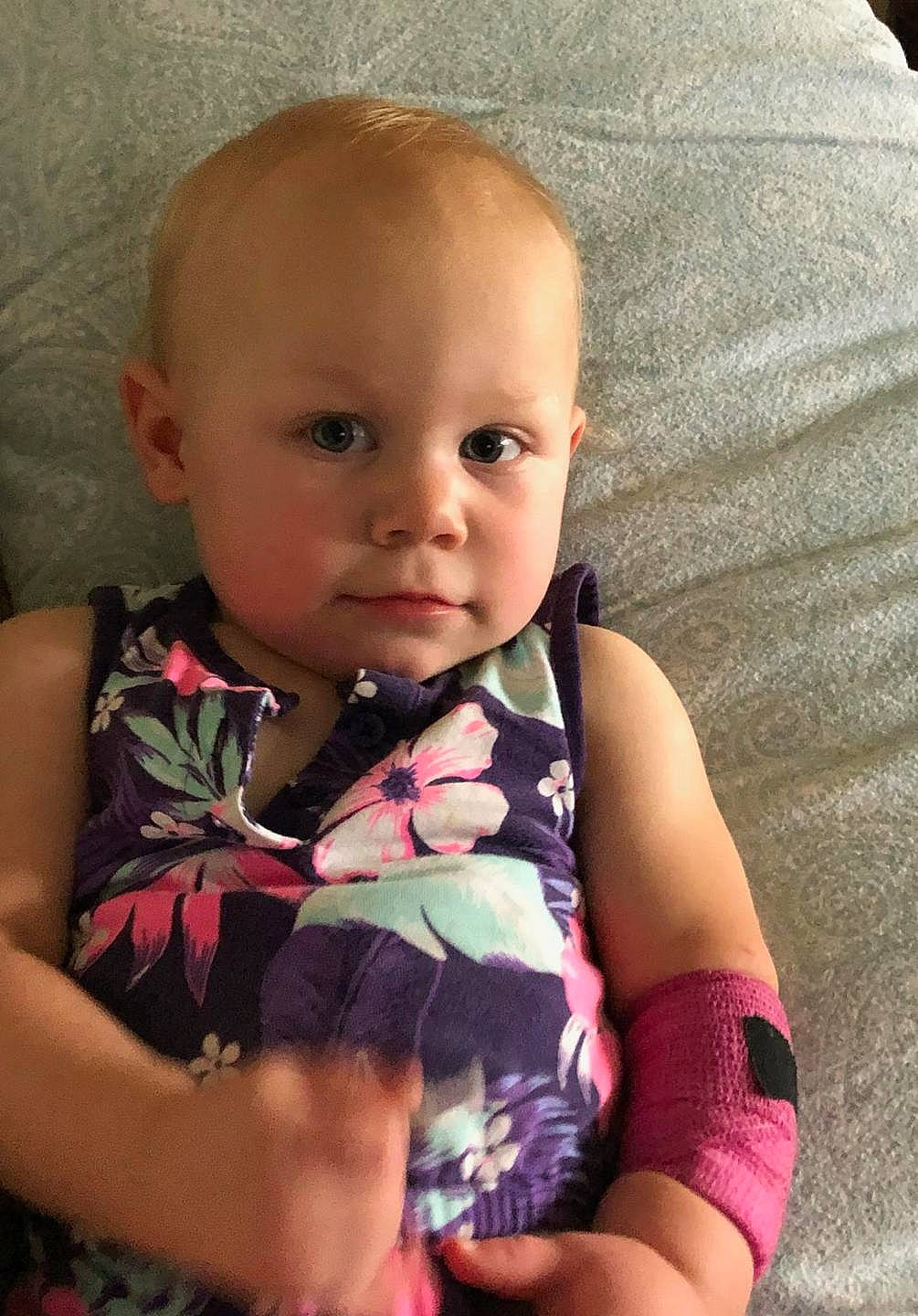 Camelia is registered to the contest to win money with this photo: arm, baby, baby_toddler_clothing, cheek, child, chin, comfort, eye, finger, hand, head, iris, lip, nose, person, pink, skin, sleeve, textile, thumb