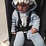 Aaron Kieffer participe au concours pour gagner de l'argent avec cette photo : baby, black, blue, child, clothing, costume, cute, expression, face, hand, hood, indoor, monster, onesie, person, seatbelt, sitting, stroller, toddler, young