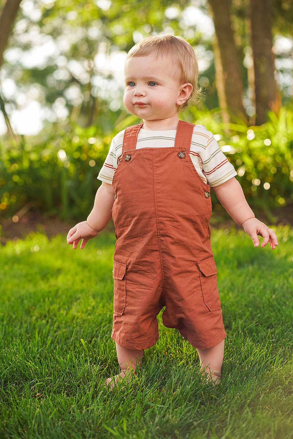 Mason is registered to the contest to win money with this photo: baby, baby_toddler_clothing, ball, child, dress, flash_photography, fun, gesture, grass, grassland, happy, leisure, meadow, people_in_nature, person, plant, playing_with_kids, sleeve, sunlight, toddler