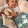Sekaiyah joined the competition — help win amazing prizes! baby, smiling, blanket, plush_toy, fabric_book, flower_pattern, pink, blue, soft_toys, child, happy, infant, cute, playtime, indoors, portrait, hands, clothing, person, cozy