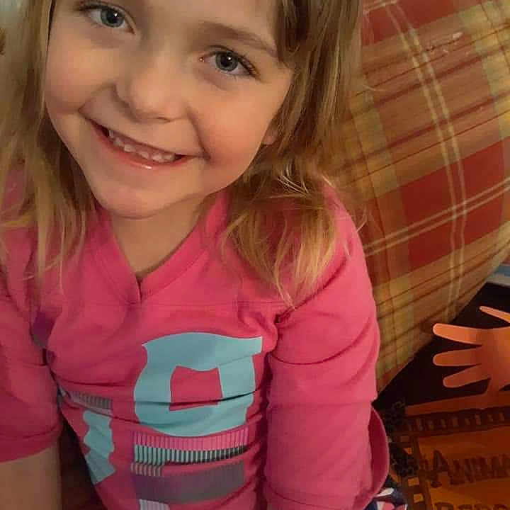 Aliyanna is registered to the contest to win money with this photo: blond, brown_hair, cheek, child, eye, face, joy, lip, mouth, person, pink, play, skin, smile, toddler, tooth