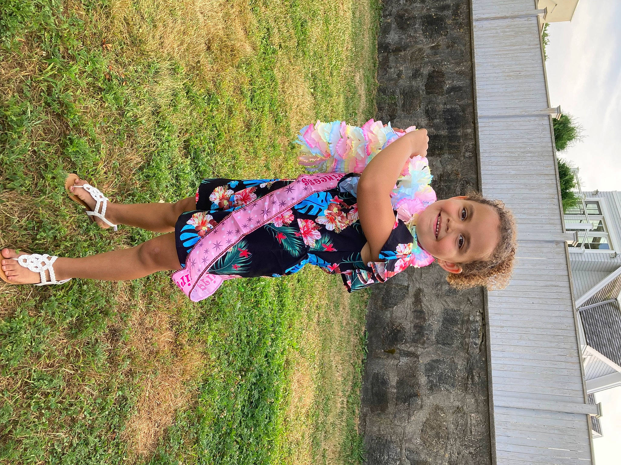 Elaina is registered to the contest to win money with this photo: child, fun, grass, grass_family, happy, house, human_leg, joy, leisure, magenta, people_in_nature, person, pink, plant, play, recreation, sky, thigh, toddler, tree