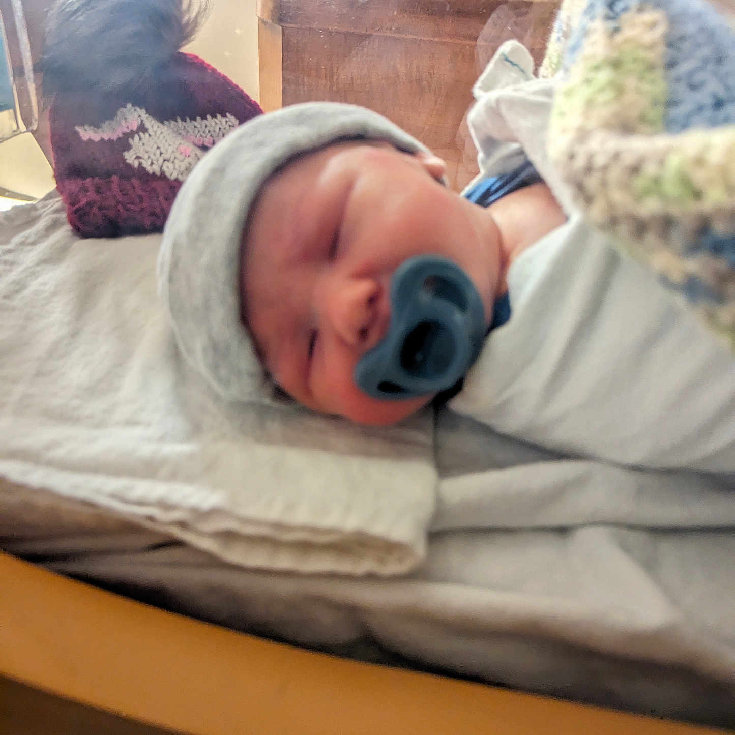 Jordan joined the competition — help win amazing prizes! architecture, baby, bed, blanket, bodypart, building, child, clothing, face, female, furniture, girl, hat, head, hospital, newborn, person, photography, portrait, sleeping