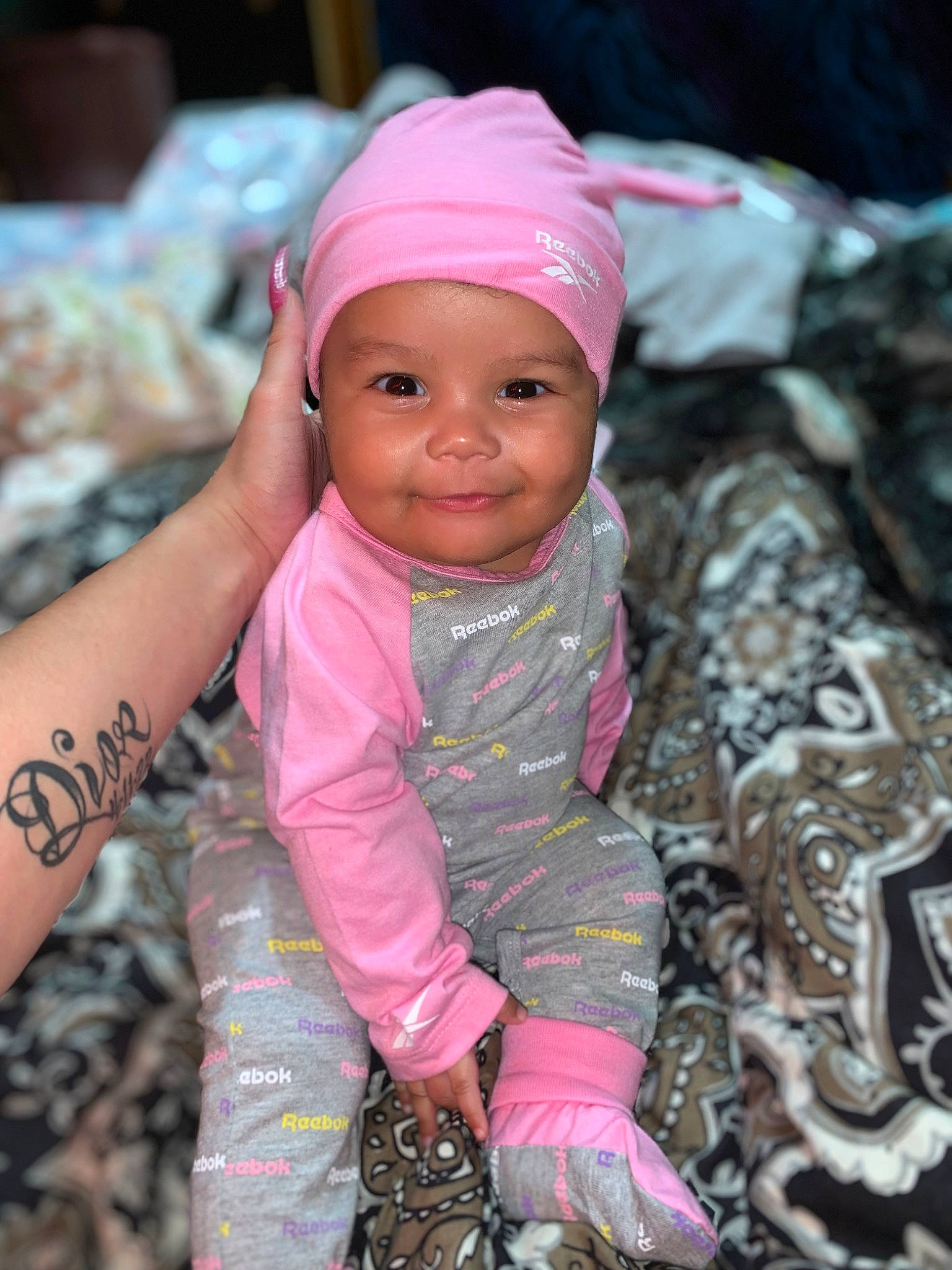 Dior joined the competition — help win amazing prizes! baby, baby_products, cap, child, eye, fashion_accessory, fun, happy, head, headgear, headwear, human_body, joy, lip, magenta, pattern, people_in_nature, person, pink, skin