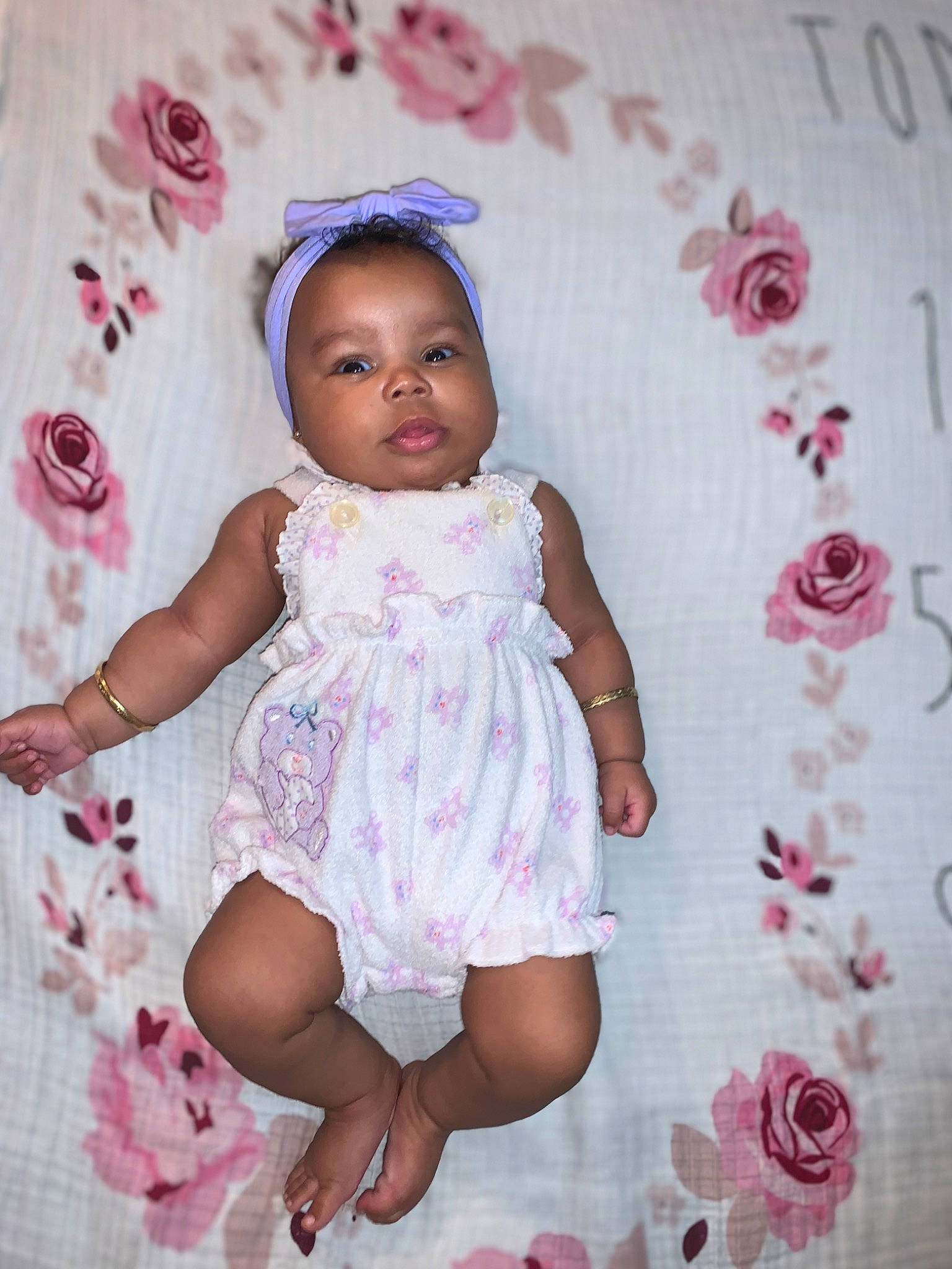 Dior is registered to the contest to win money with this photo: baby, baby_toddler_clothing, cheek, chin, dress, eye, face, flash_photography, hairstyle, head, headgear, iris, lip, person, pink, purple, skin, sleeve, textile, violet