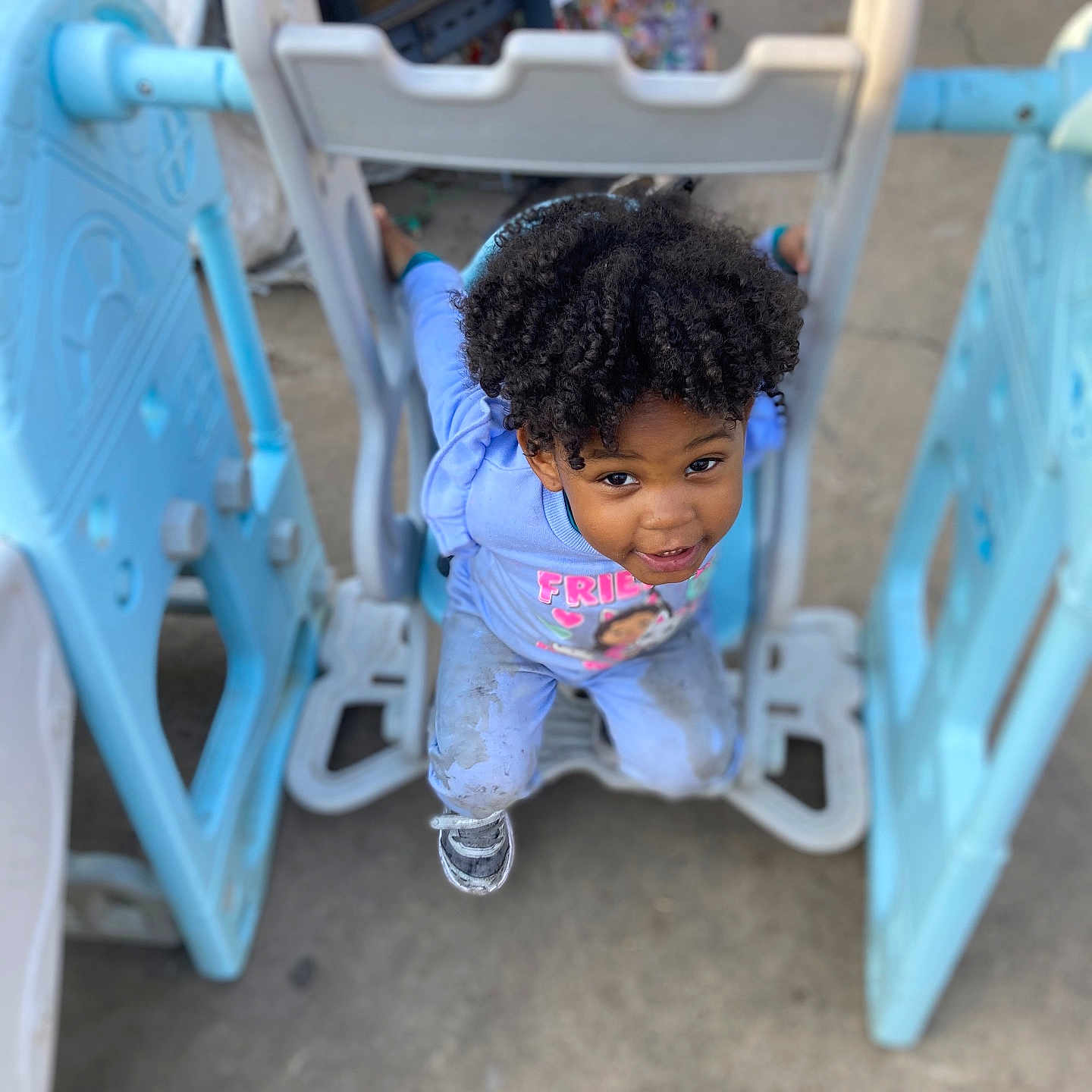 Brinleigh joined the competition — help win amazing prizes! chair, child, clothing, crib, face, female, footwear, furniture, girl, hair, head, infantbed, nature, outdoors, pants, person, photography, portrait, shoe, sitting