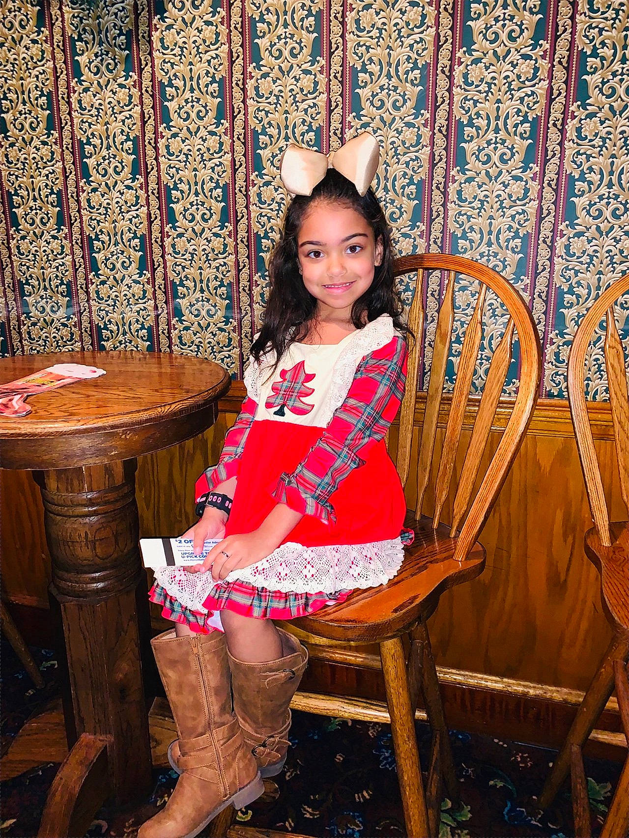 Madilyn is registered to the contest to win money with this photo: chair, child, child_model, furniture, joy, long_hair, person, pink, sitting, skin, textile