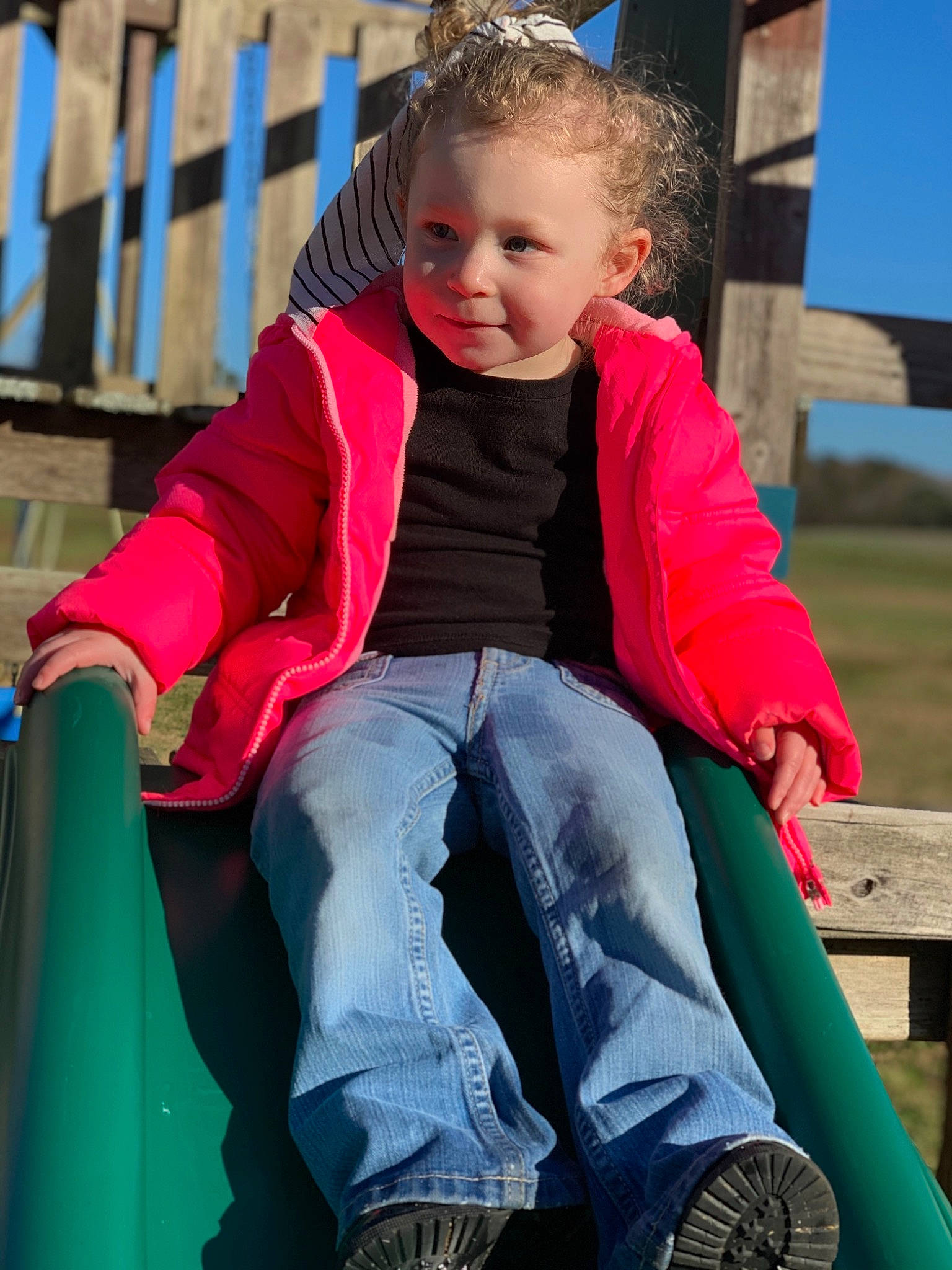 Gabriella joined the competition — help win amazing prizes! black, blue, city, clothing, electric_blue, facial_expression, fun, grass, green, happy, jeans, leisure, outerwear, person, photograph, pink, recreation, smile, snapshot, toddler
