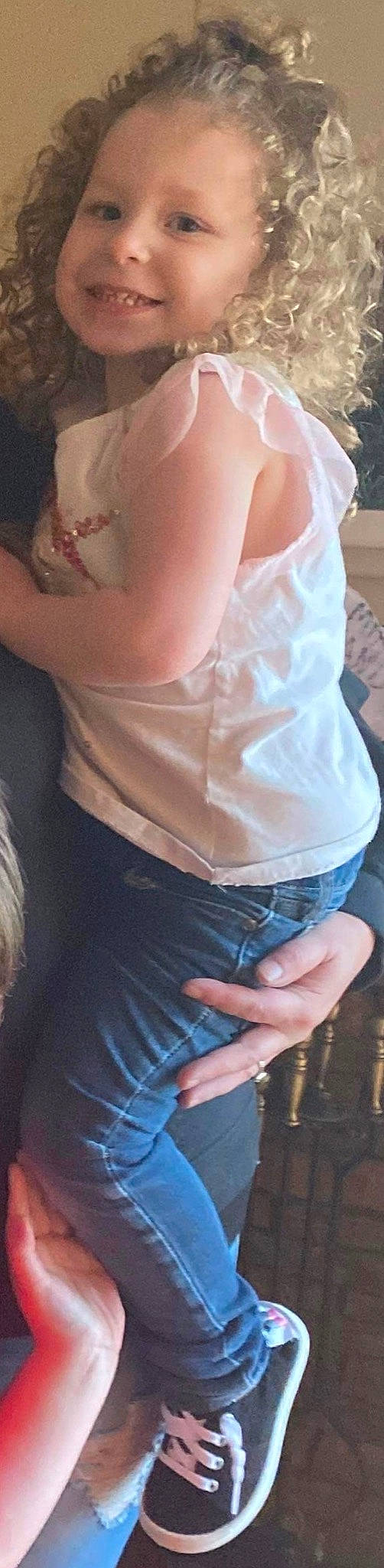 Gabriella is registered to the contest to win money with this photo: abdomen, chest, dress_shirt, elbow, finger, gesture, hand, human_body, joint, joy, nail, neck, person, shoulder, sleeve, sunglasses, t_shirt, thigh, thumb, trunk