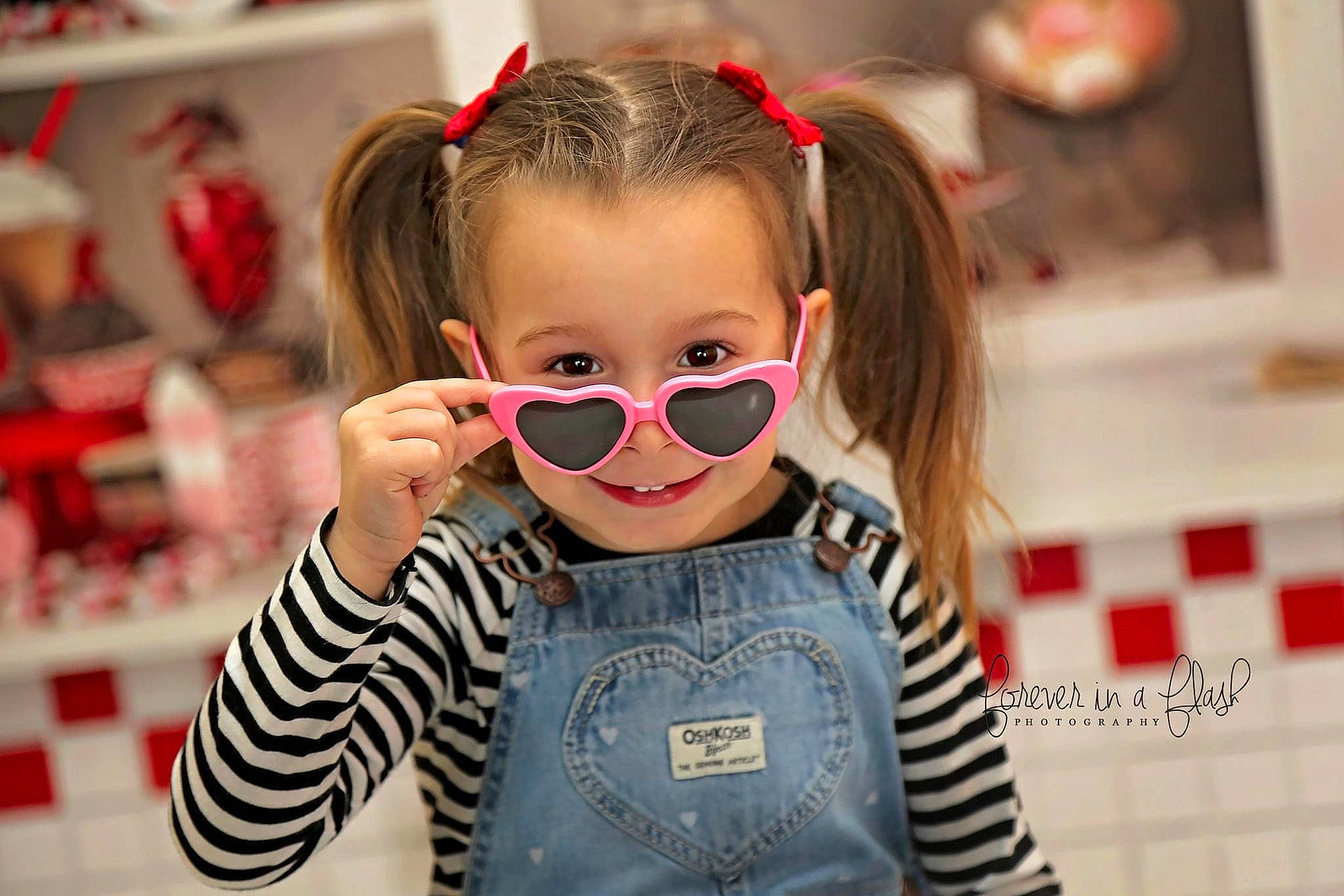 Liliana is registered to the contest to win money with this photo: baby, baby_toddler_clothing, beauty, cheek, eyelash, eyewear, fun, gesture, goggles, happy, head, lip, nose, person, red, skin, sleeve, smile, street_fashion, toddler