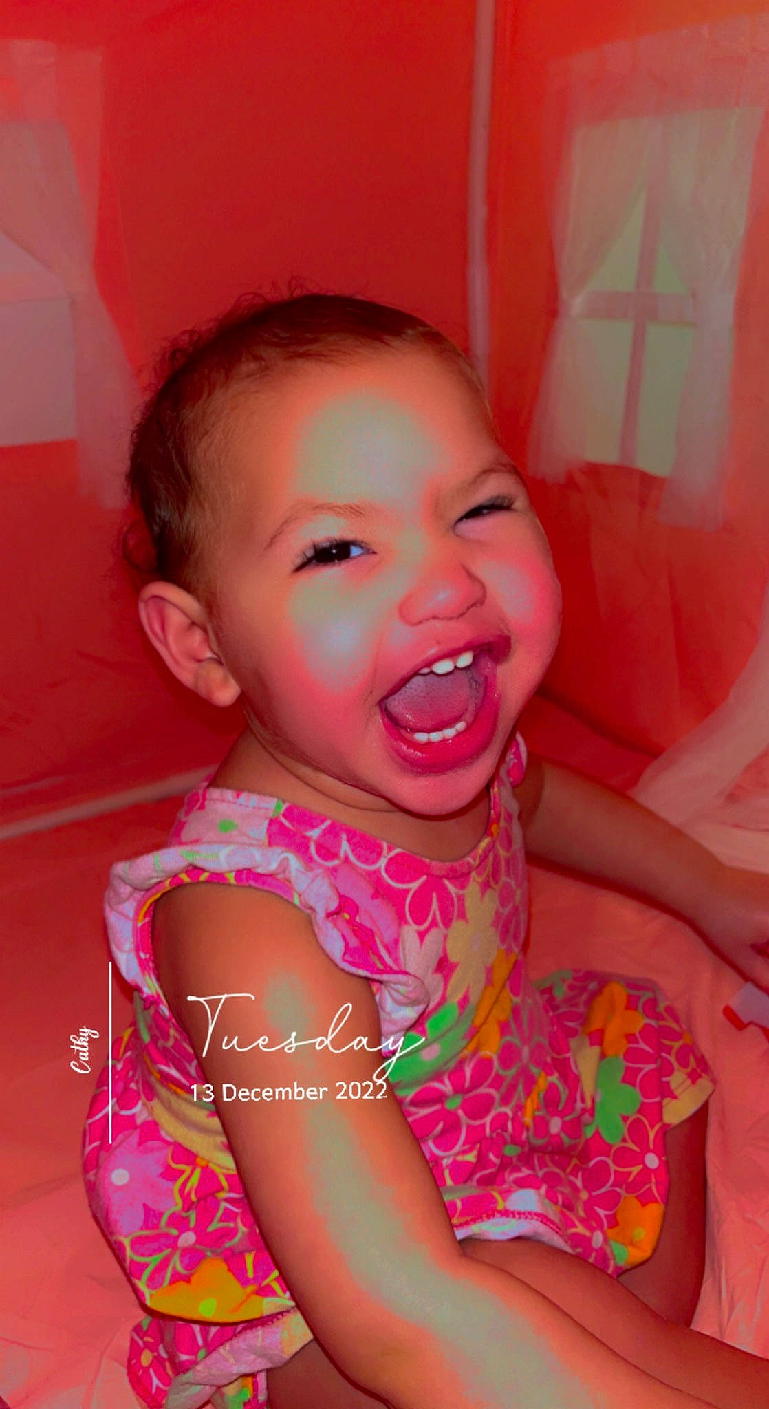 Madisyn is registered to the contest to win money with this photo: arm, baby_toddler_clothing, cheek, child, eyebrow, eyelash, facial_expression, fun, happy, iris, lip, magenta, mouth, neck, nose, person, pink, skin, smile, toddler