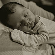 Dempsey joined the competition — help win amazing prizes! baby, sleeping, infant, blanket, soft, cozy, face, cute, peaceful, newborn, child, pajamas, rest, portrait, closeup, calm, indoors, toddler, monochrome, sepia