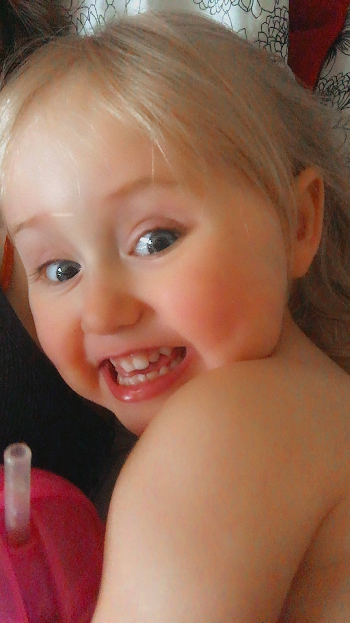 Thea is registered to the contest to win money with this photo: cheek, chest, chin, ear, eye, eyebrow, eyelash, finger, forehead, hair, happy, iris, lip, mouth, neck, nose, person, skin, smile, toddler