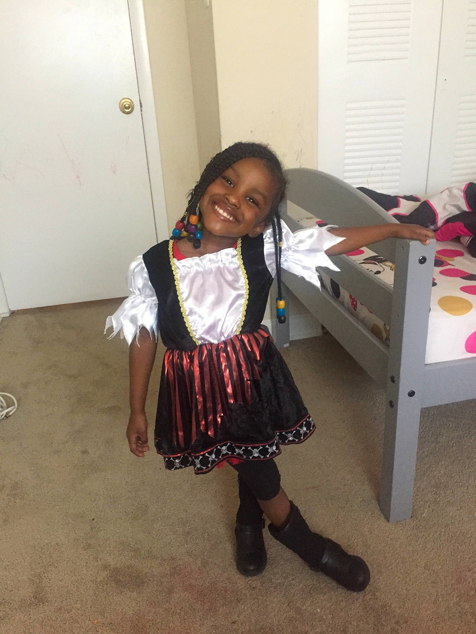 Skylar joined the competition — help win amazing prizes! black, black_hair, child, clothing, costume, dress, fashion, footwear, joy, knee, long_hair, person, room, school_uniform, shoe, smile, tights, uniform