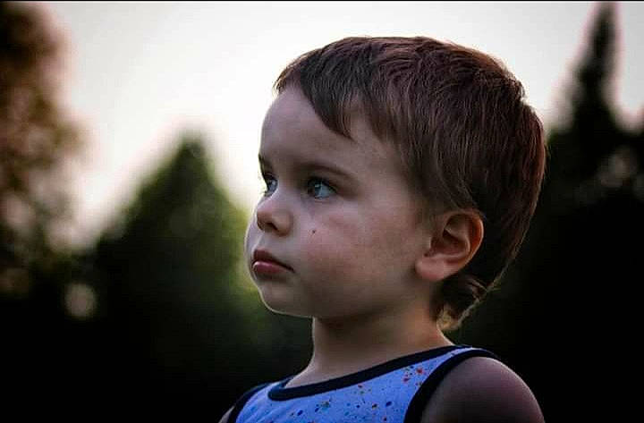 Jayceon is registered to the contest to win money with this photo: black_hair, child, chin, eyebrow, eyelash, flash_photography, fun, hair, happy, iris, jaw, neck, nose, person, shoulder, skin, sky, sunlight, t_shirt, toddler