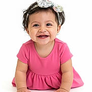 Mina joined the competition — help win amazing prizes! adorable, baby, child, closeup, crawling, cute, expression, face, fashion, girl, hands, happy, headband, infant, pink_dress, portrait, smiling, studio_photo, white_background, young_child
