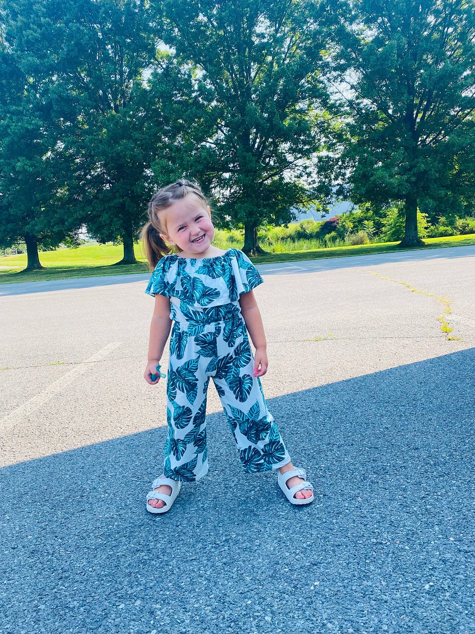 Koda Paige is registered to the contest to win money with this photo: asphalt, child, denim, electric_blue, fun, grass, happy, joy, leaf, leisure, people_in_nature, person, plant, recreation, road_surface, sidewalk, smile, summer, tints_and_shades, toddler