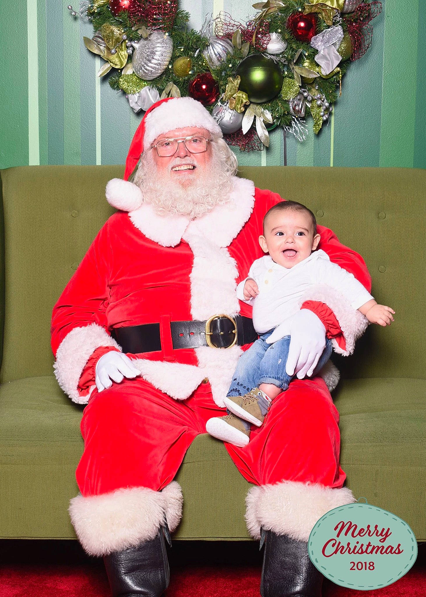 Kamrin joined the competition — help win amazing prizes! christmas, christmas_decoration, fictional_character, headwear, holiday, joy, lap, person, santa_claus