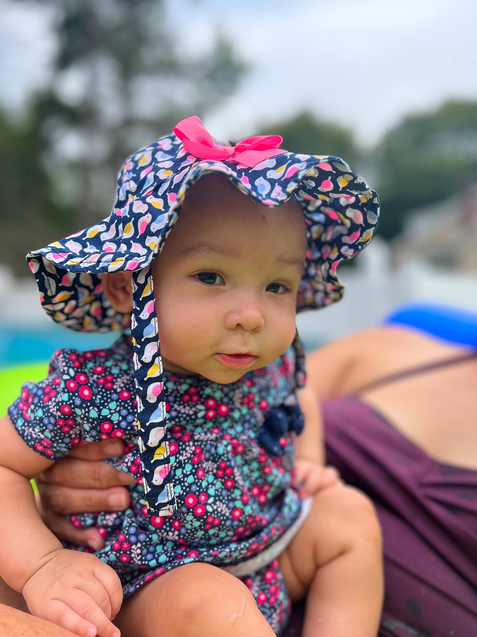 Amiyah joined the competition — help win amazing prizes! baby, baby_toddler_clothing, cap, child, electric_blue, eye, face, fashion_accessory, fun, grass, happy, hat, headgear, headwear, leisure, magenta, pattern, person, recreation, sitting
