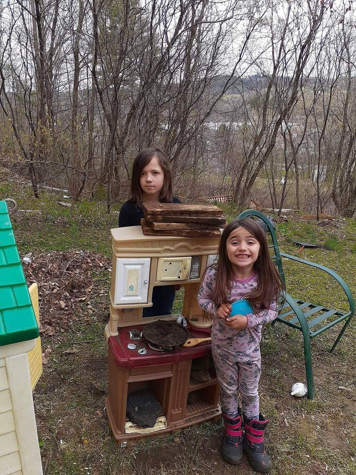 Jasmine is registered to the contest to win money with this photo: backyard, child, fawn, furniture, grass, house, joy, person, plant, play, table, tree, winter