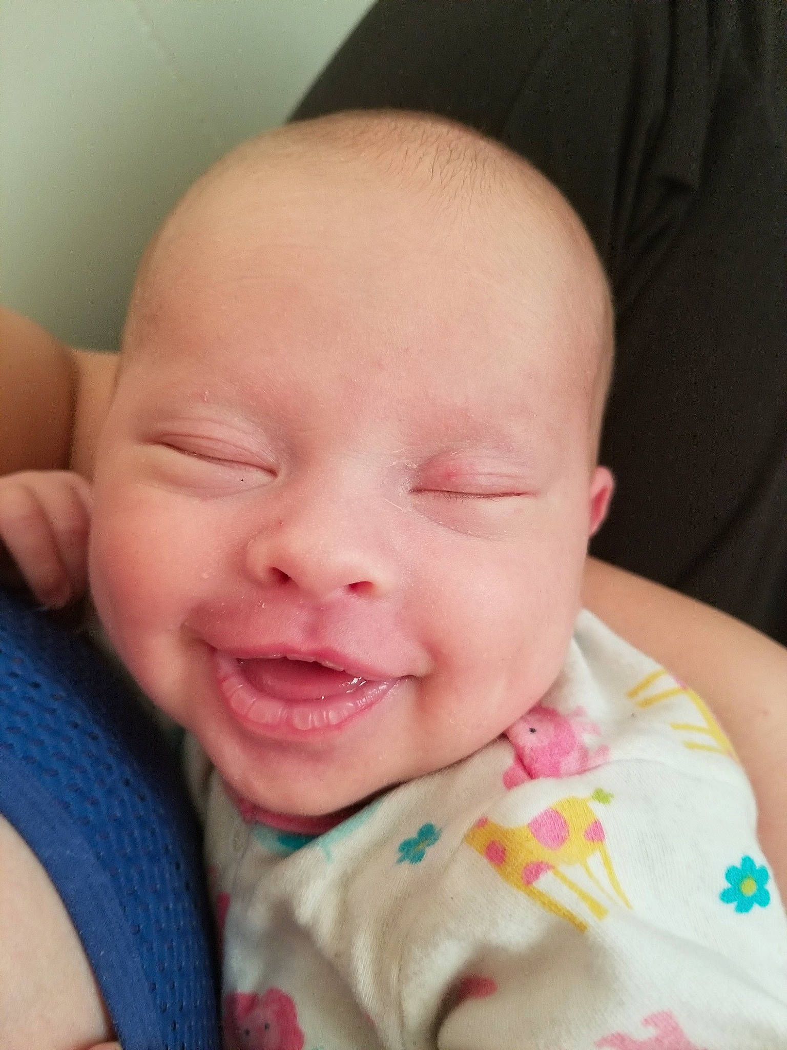 Brooklyn is registered to the contest to win money with this photo: bedtime, cheek, child, chin, close_up, ear, face, finger, forehead, hand, head, infant, lip, mouth, nose, person, skin, sleep, smile, toddler