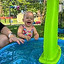 toddler, child, water, pool, outdoor, summer, play, happy, laughing, toy, hand, grass, fence, sunlight, sunny, person, sleeveless, garden, fun, daytime