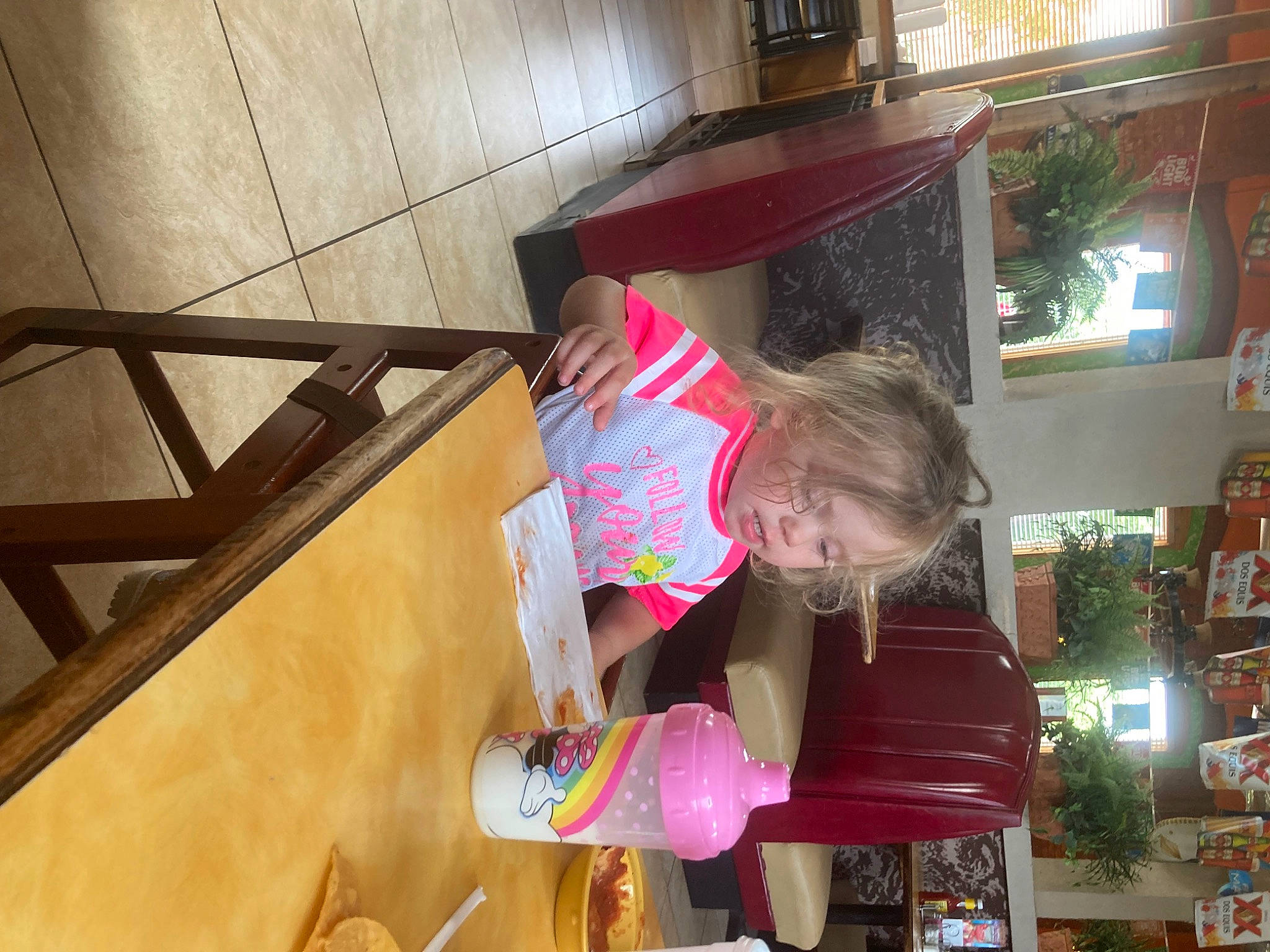 Aubrey is registered to the contest to win money with this photo: baby_toddler_clothing, child, flooring, fun, handrail, hardwood, magenta, person, room, shelf, toddler, window, wood, wood_stain