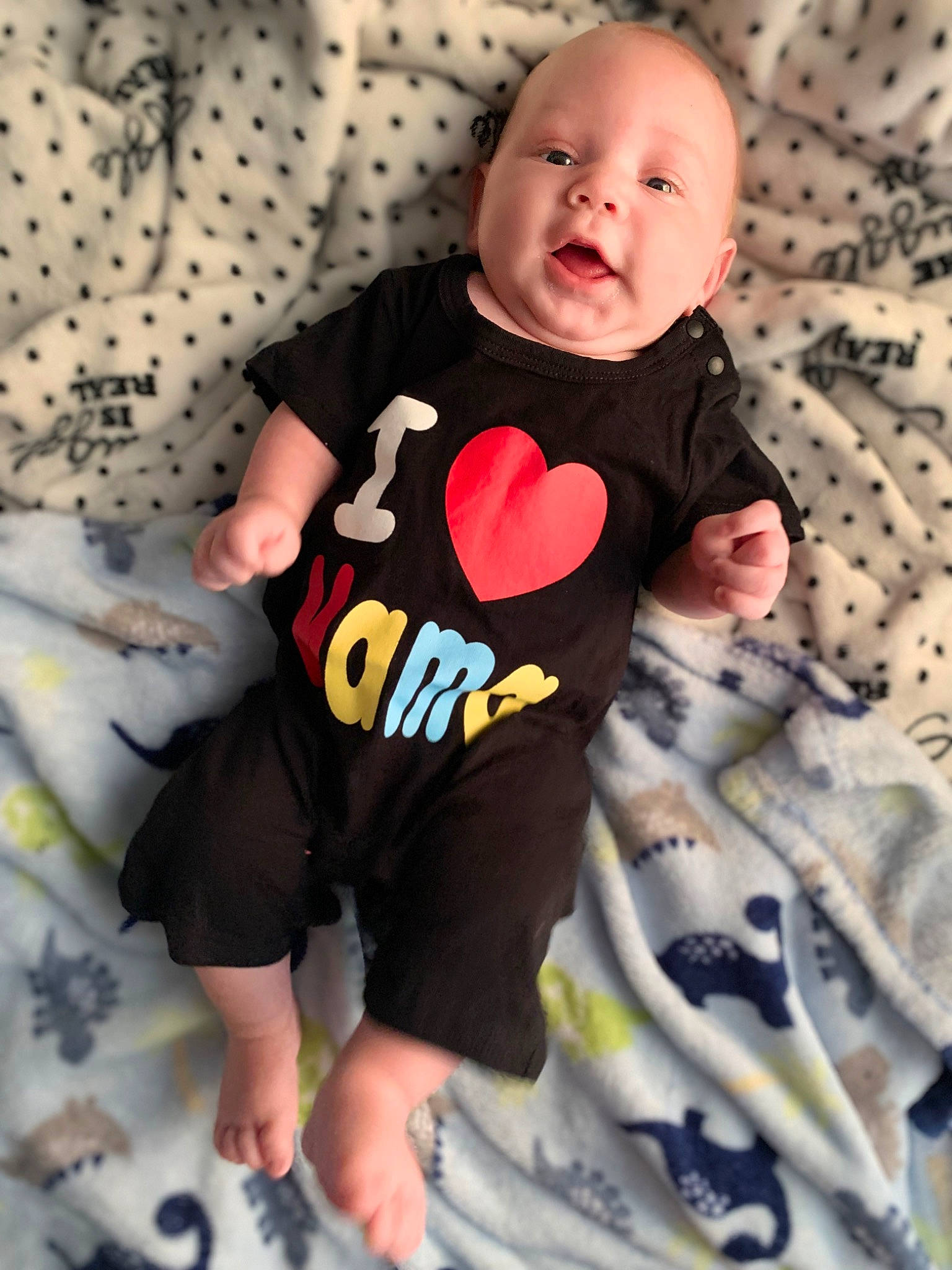 Leo joined the competition — help win amazing prizes! baby, baby_products, baby_toddler_clothing, cheek, child, comfort, face, grey, happy, human_leg, linens, pattern, person, room, sitting, skin, sleeve, t_shirt, thigh, toddler