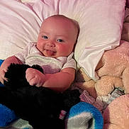 Kyler joined the competition — help win amazing prizes! baby, bed, bedroom, blanket, couch, crib, cushion, face, furniture, happy, head, homedecor, indoors, infantbed, person, photography, portrait, quilt, room, smile