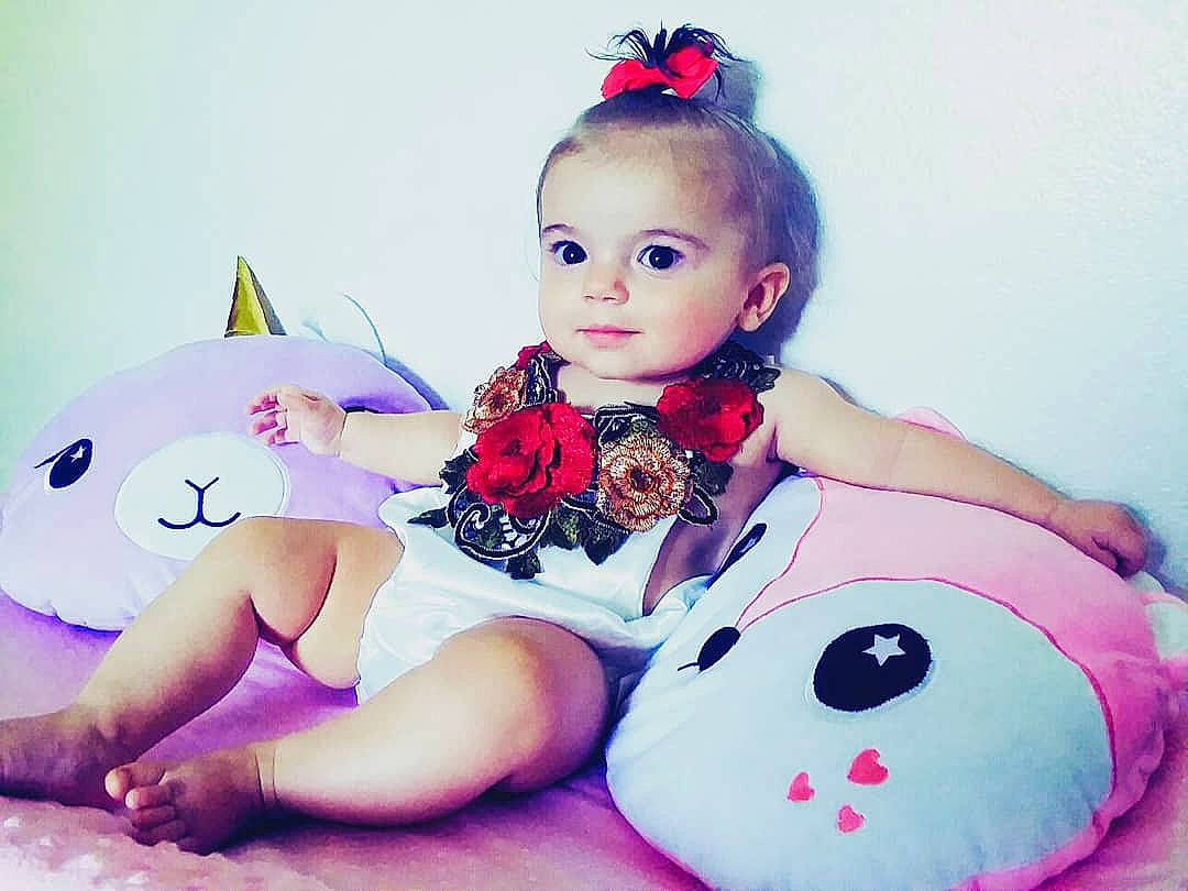 Alesha is registered to the contest to win money with this photo: beauty, black_hair, blond, child, ear, headpiece, lip, person, photo_shoot, pink, stuffed_toy