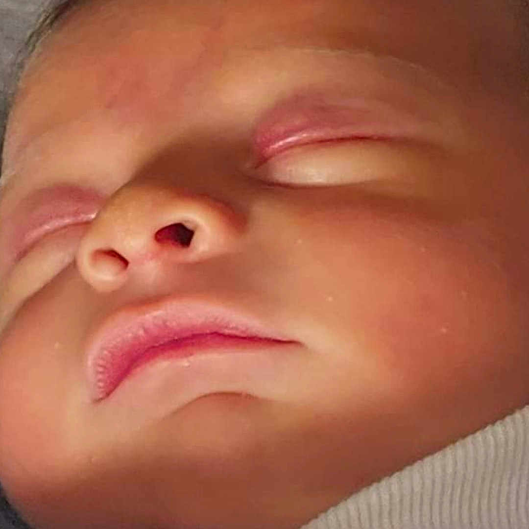 Levi Jaxson is registered to the contest to win money with this photo: architecture, baby, blanket, building, face, head, hospital, newborn, person, photography, portrait, skin, sleeping