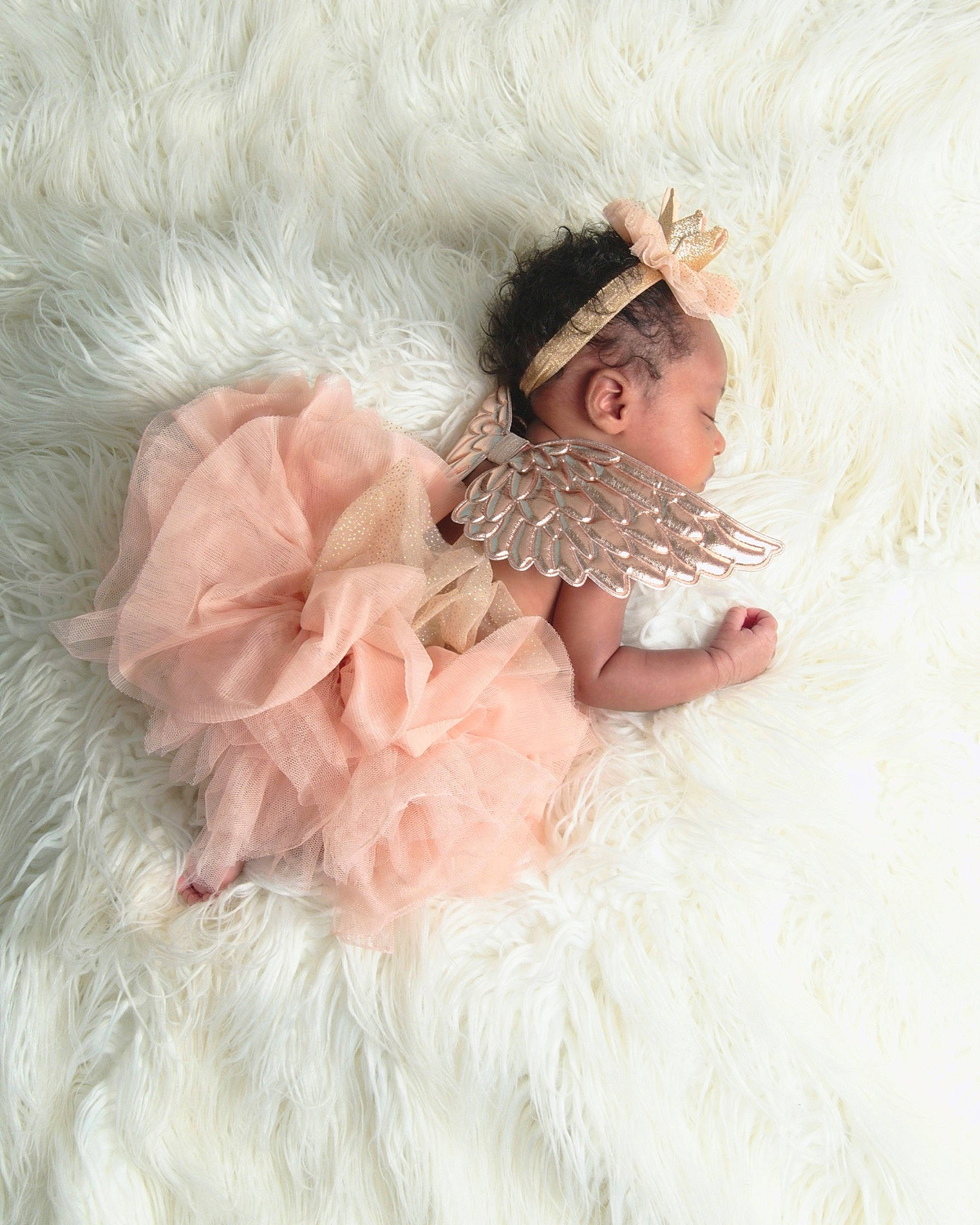 Tori joined the competition — help win amazing prizes! baby, baby_toddler_clothing, bridal_accessory, child, costume, embellishment, fashion_accessory, fashion_design, fur, fur_clothing, hair_accessory, headgear, headpiece, natural_material, peach, person, petal, pink, ruffle, sleeve