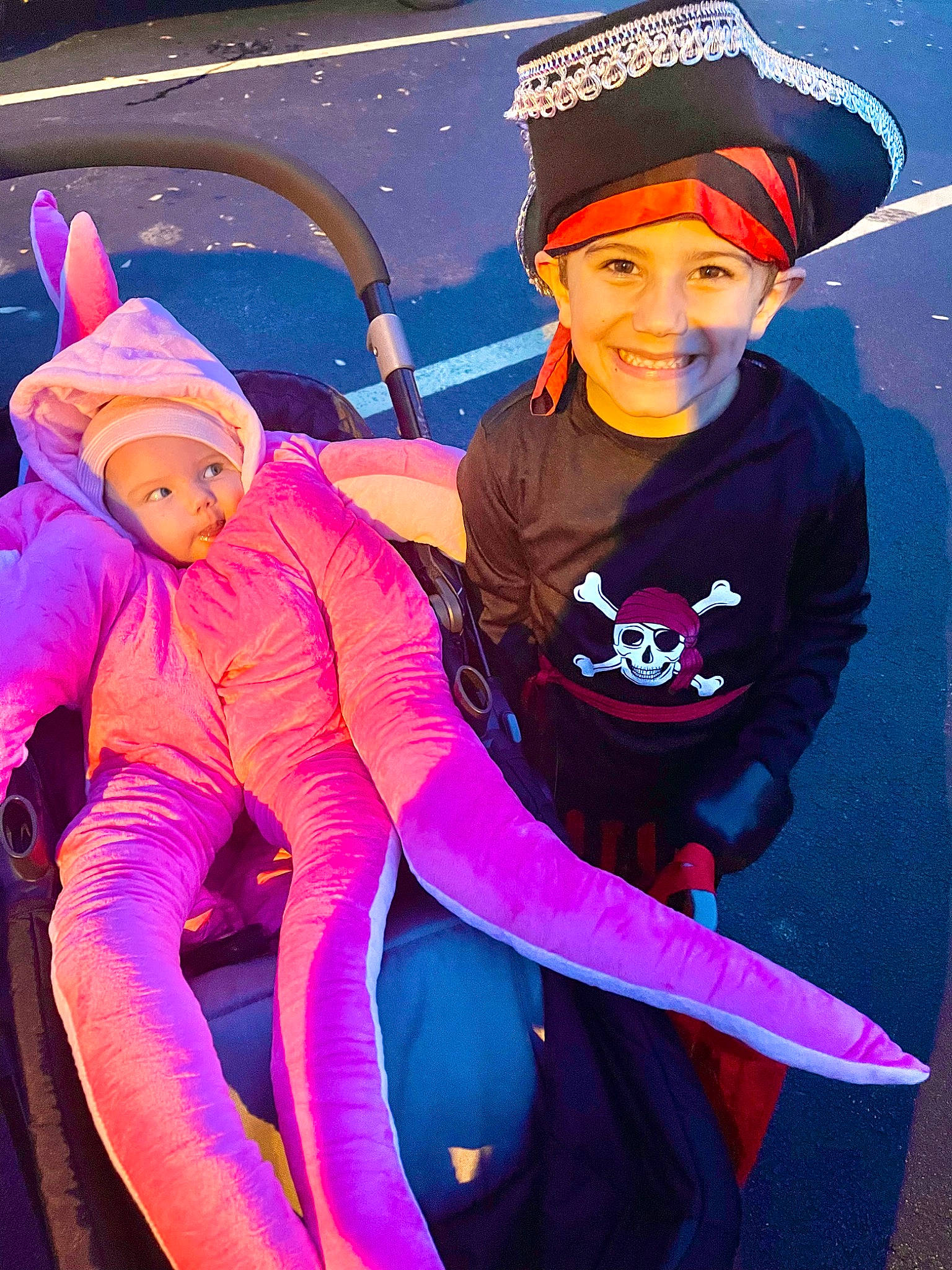 Grayson is registered to the contest to win money with this photo: baseball_cap, cap, electric_blue, entertainment, event, face, fictional_character, fun, glove, happy, headwear, human_body, joy, leisure, magenta, performance, performing_arts, person, pink, purple